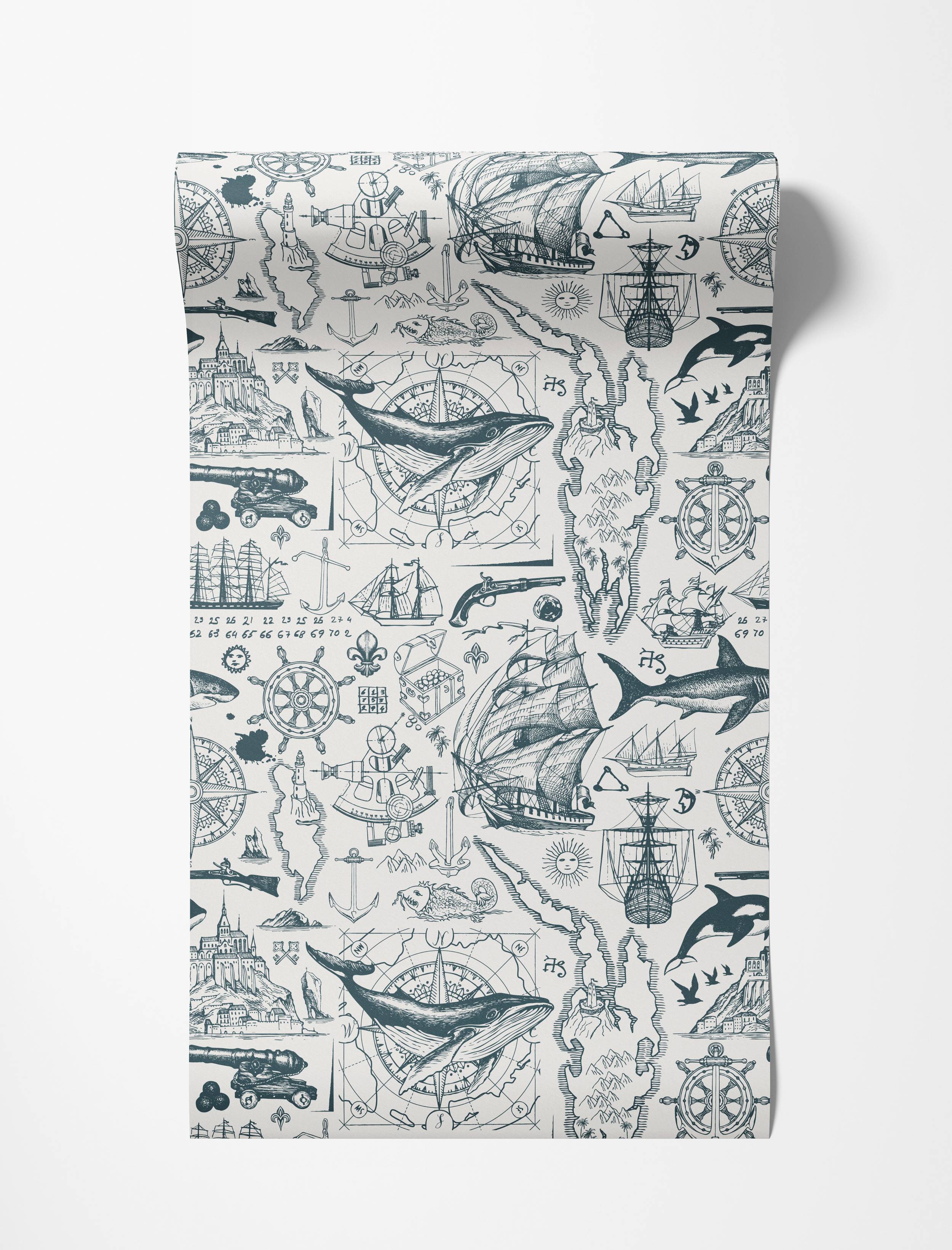 Vintage nautical wallpaper with blue illustrations of ships, whales, and compasses on a white background.