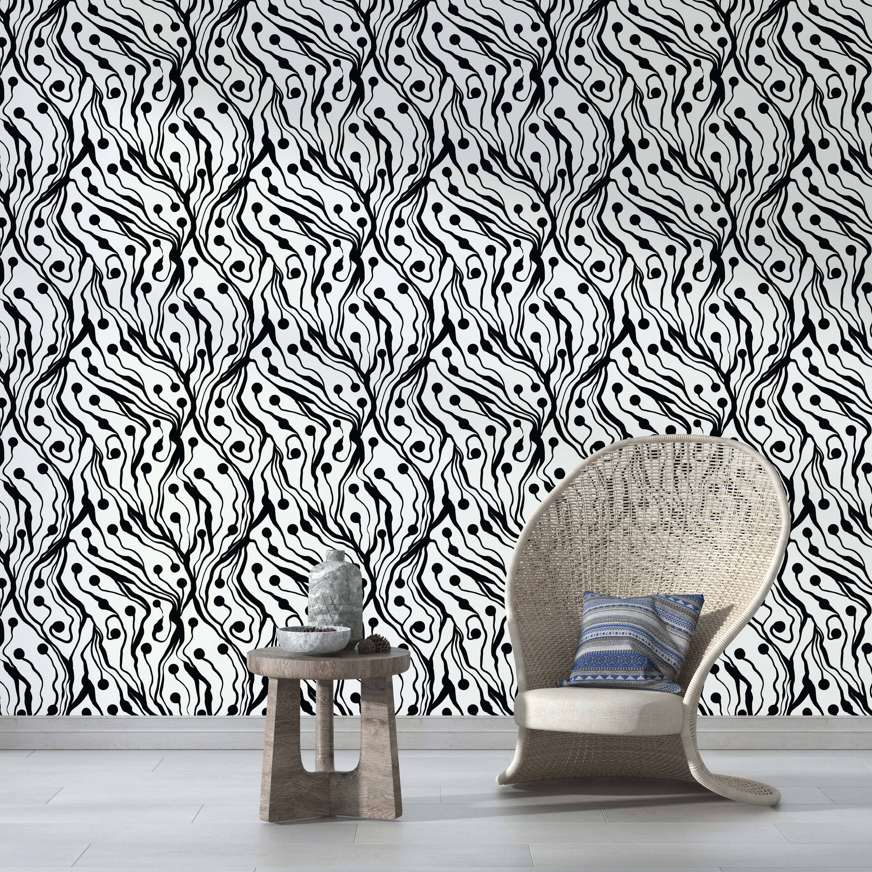 Black and white wallpaper with a pattern of flowing, organic lines ending in circular dots.