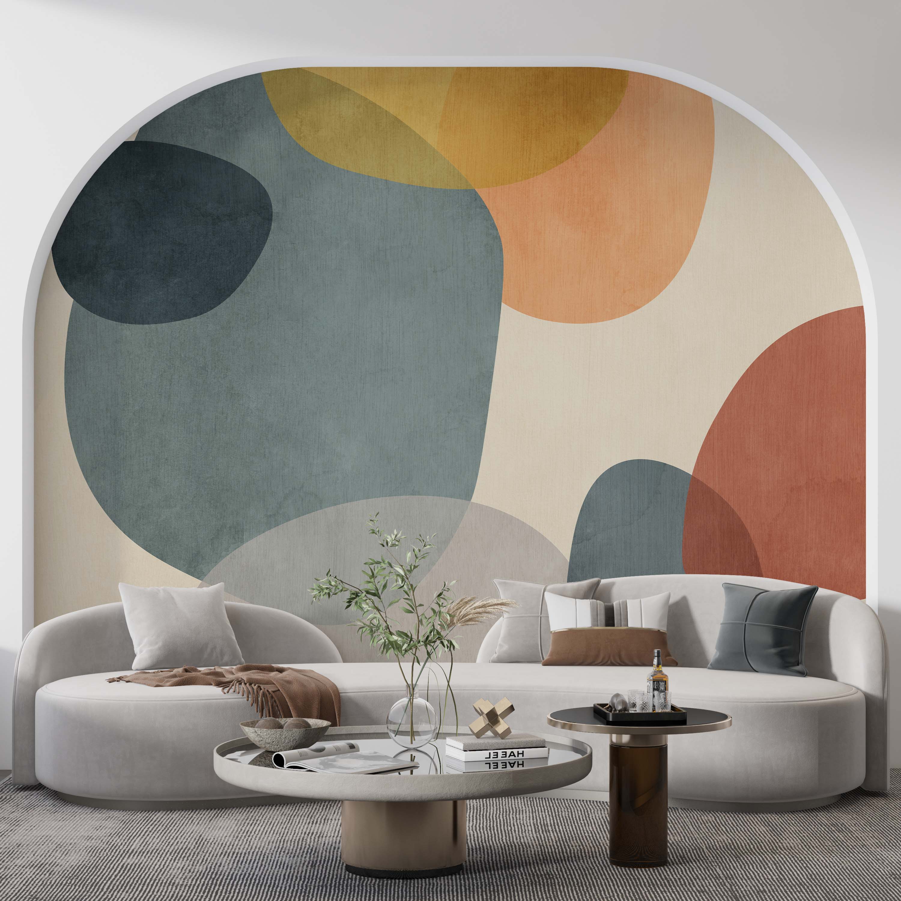 Abstract mural of large, overlapping organic shapes with a textured finish in blue-gray, ochre, terracotta, and cream.