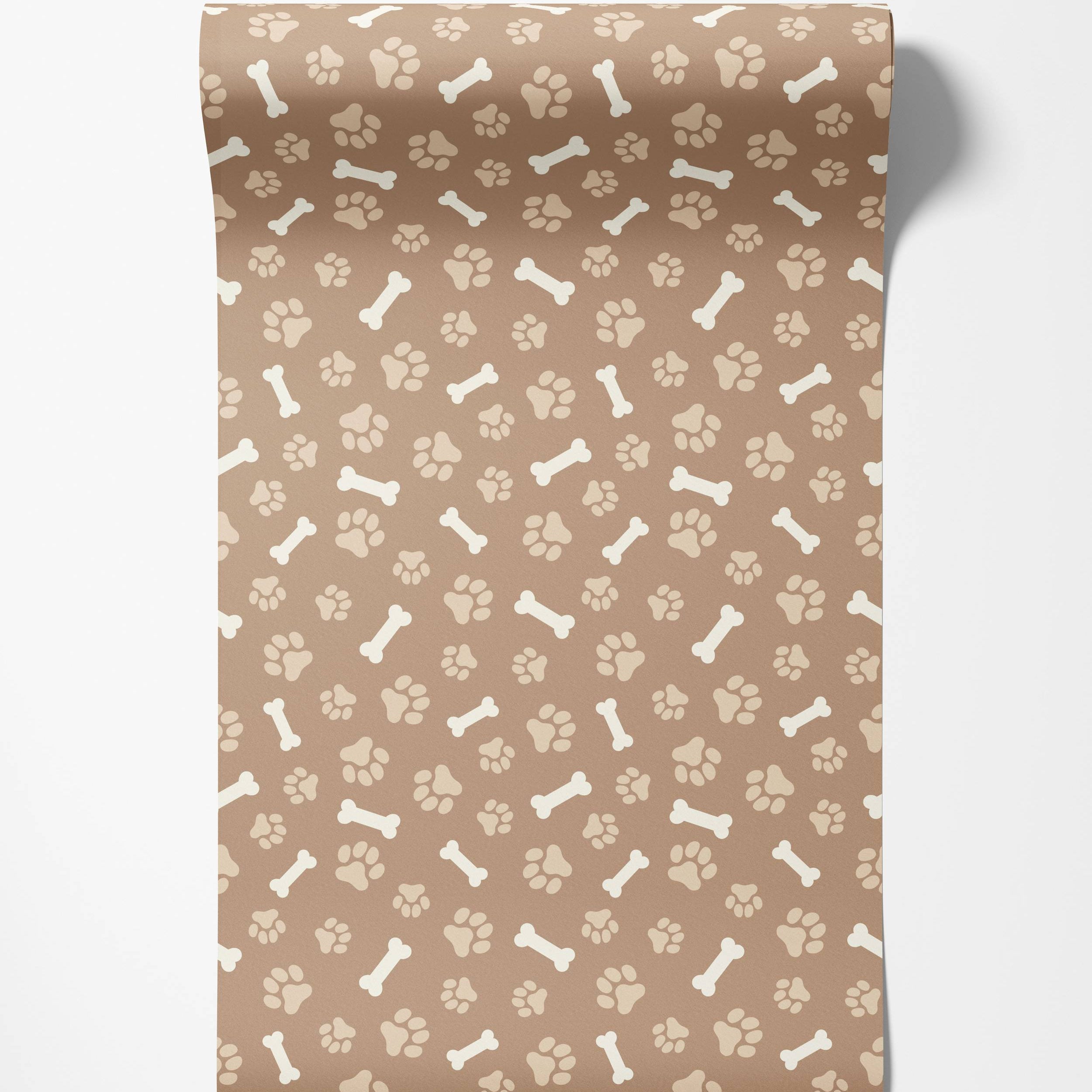 Wallpaper with a repeating pattern of beige paw prints and cream bones on a brown background.