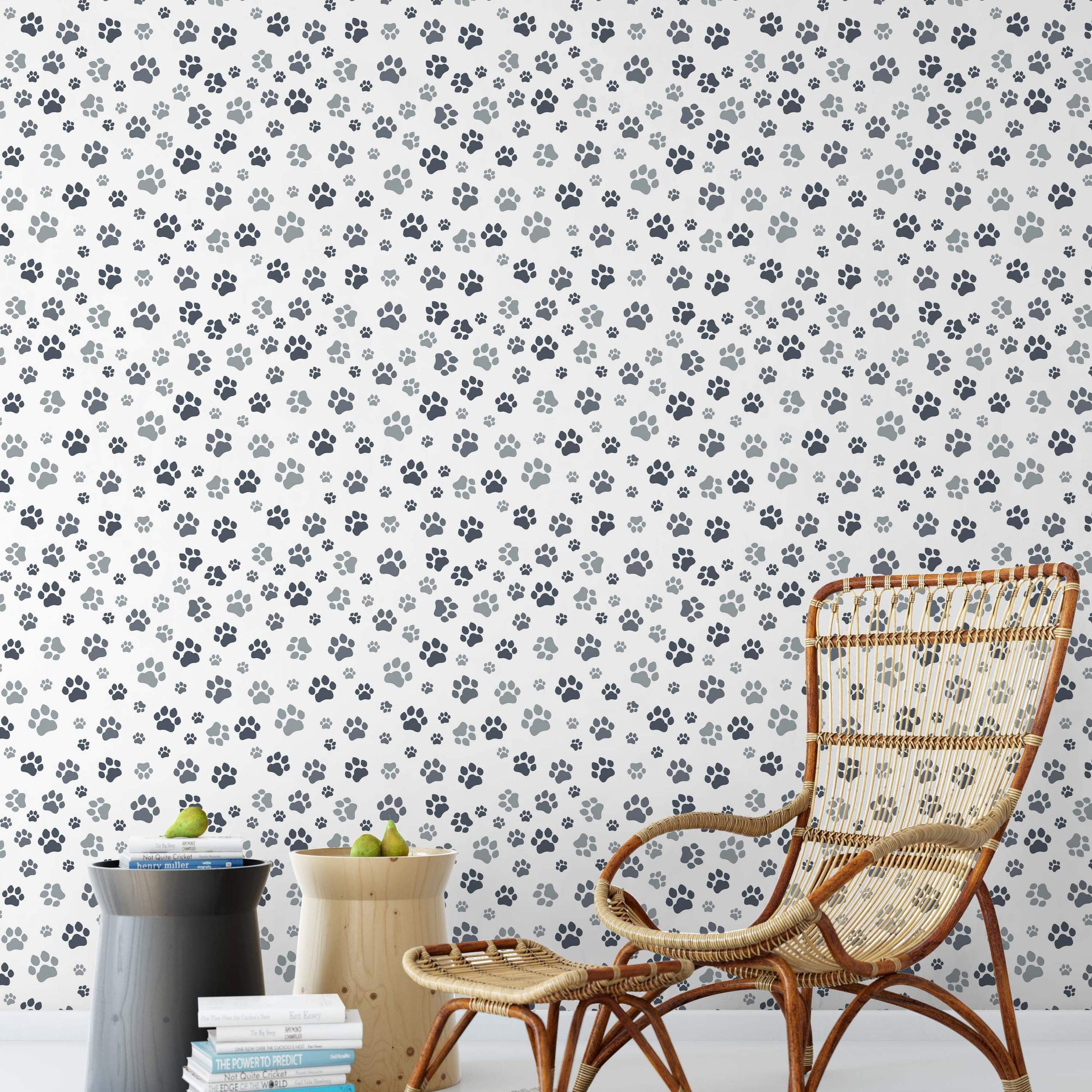 Gray and black paw print wallpaper in a repeating pattern