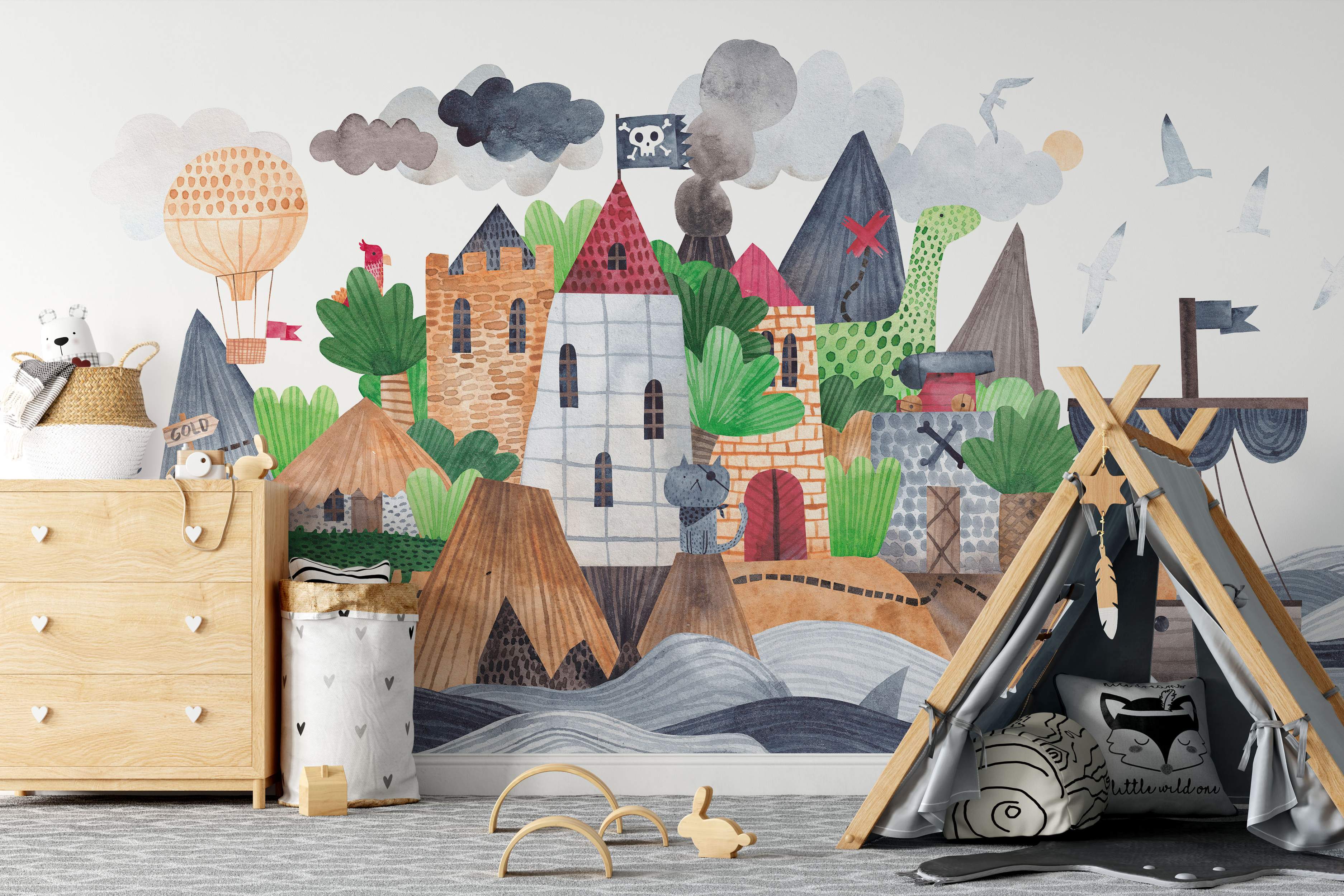 Watercolor illustration mural depicting a fantasy pirate island with castles, mountains, volcano, dinosaur, and hot air balloon.