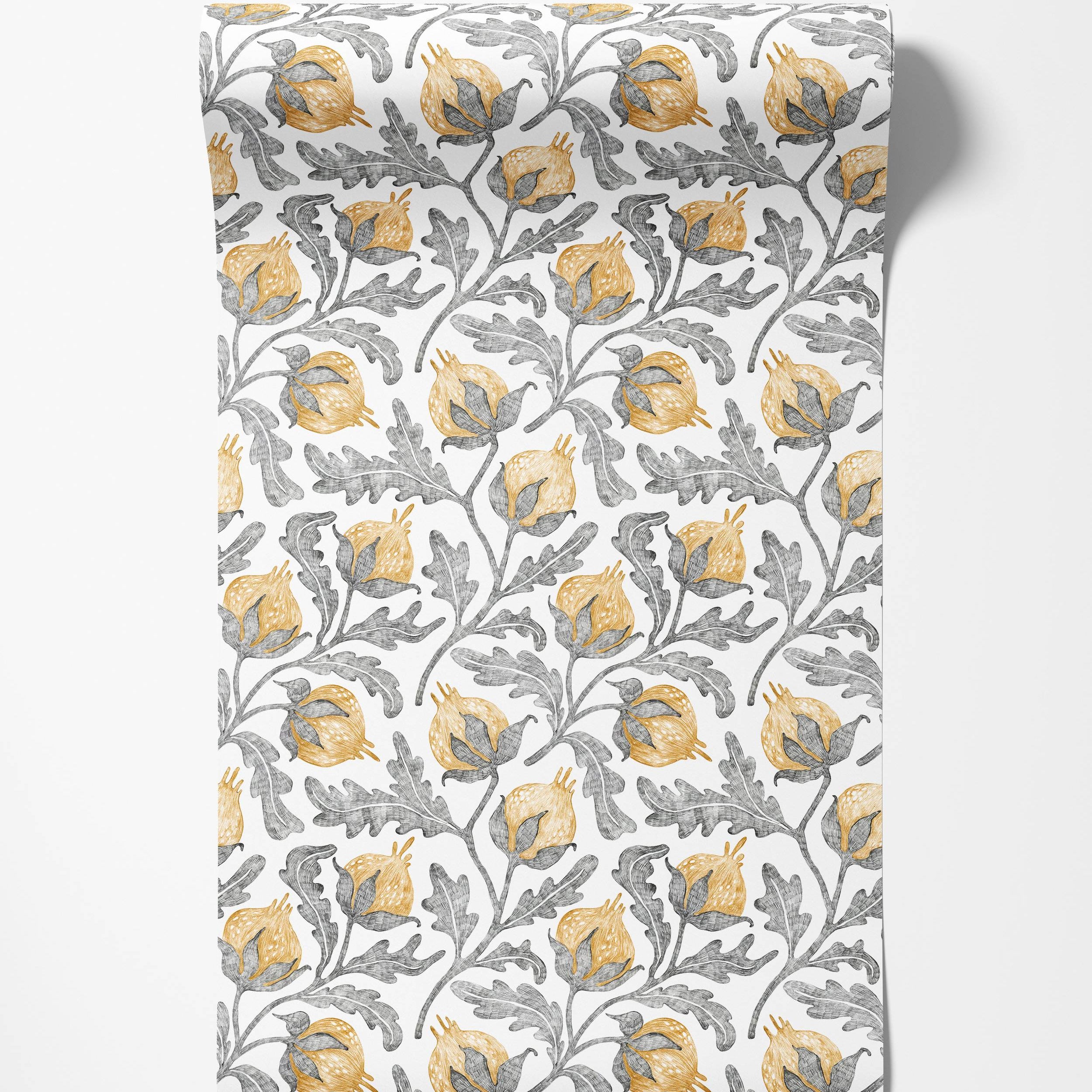 A botanical wallpaper with a hand-drawn pattern of yellow pomegranates and gray leaves on a white background.