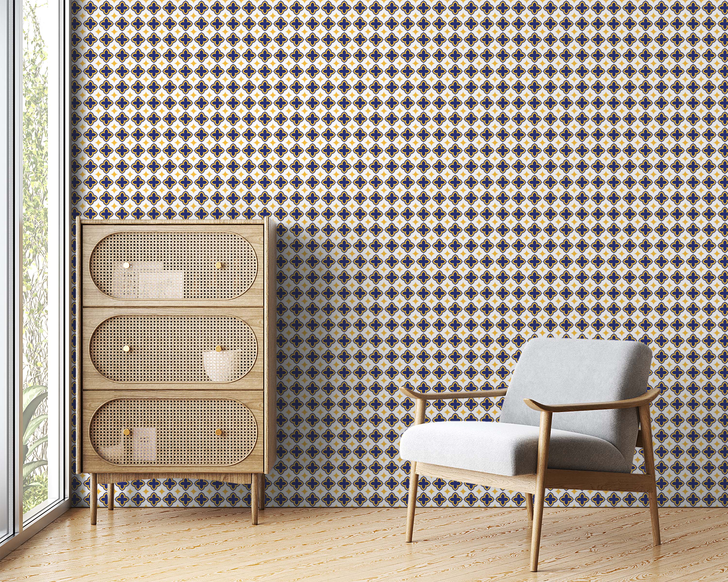 A geometric wallpaper with a repeating pattern of blue quatrefoil shapes and yellow stars on a light background.