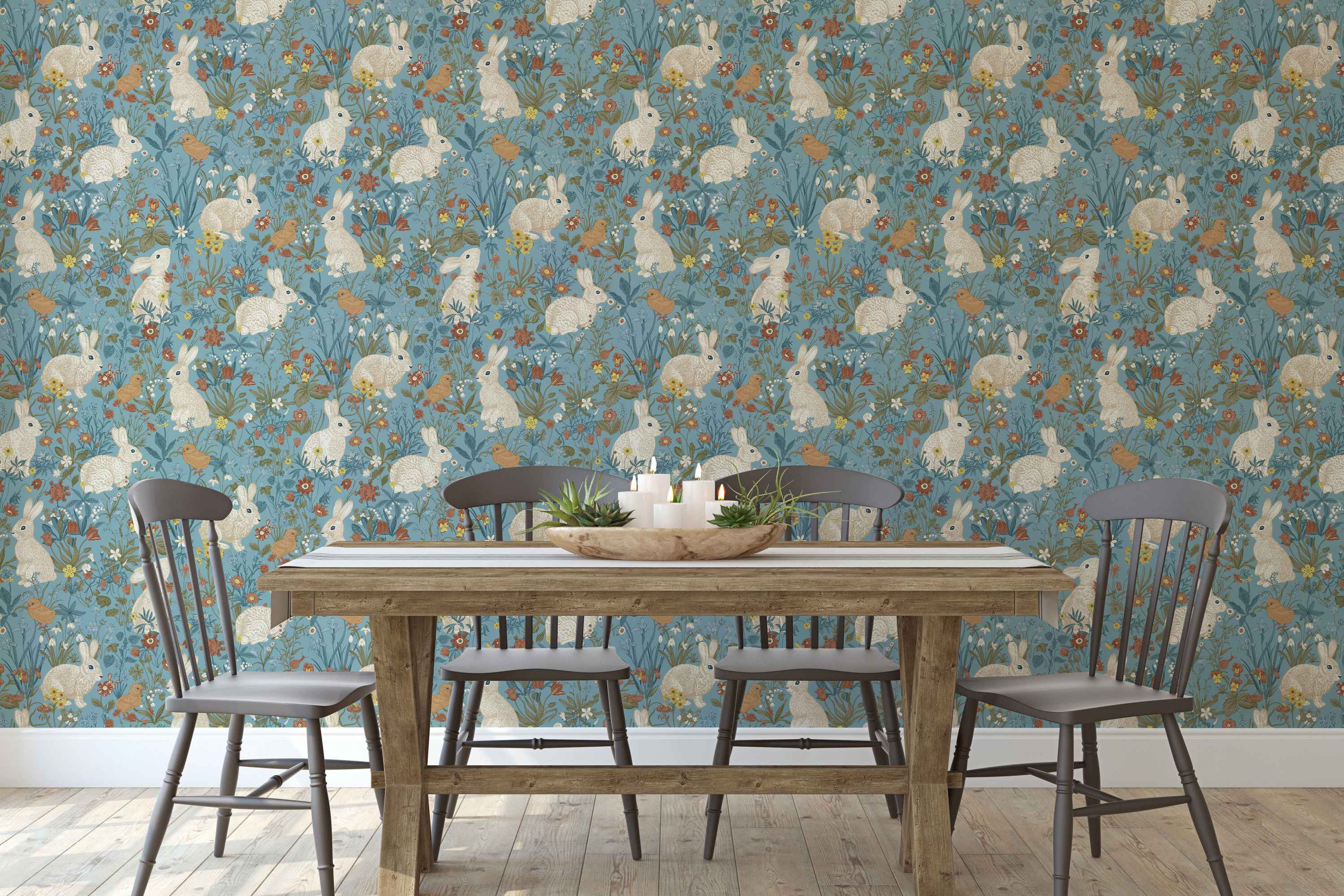 Wallpaper features illustrated white rabbits, brown birds, and colorful wildflowers on a muted blue background.