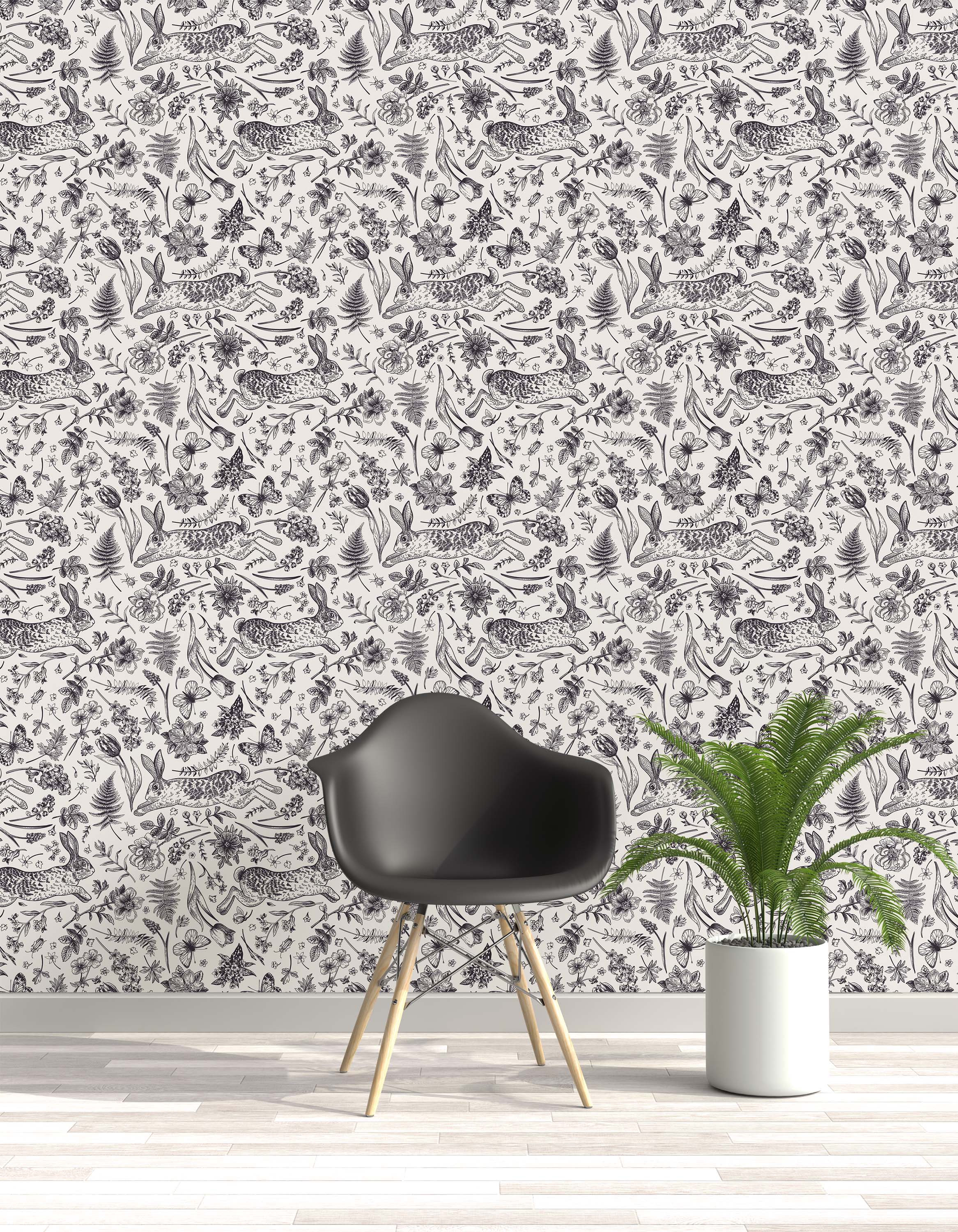 Monochrome wallpaper with a detailed, hand-drawn pattern of leaping rabbits, flowers, butterflies, and ferns on a cream background.