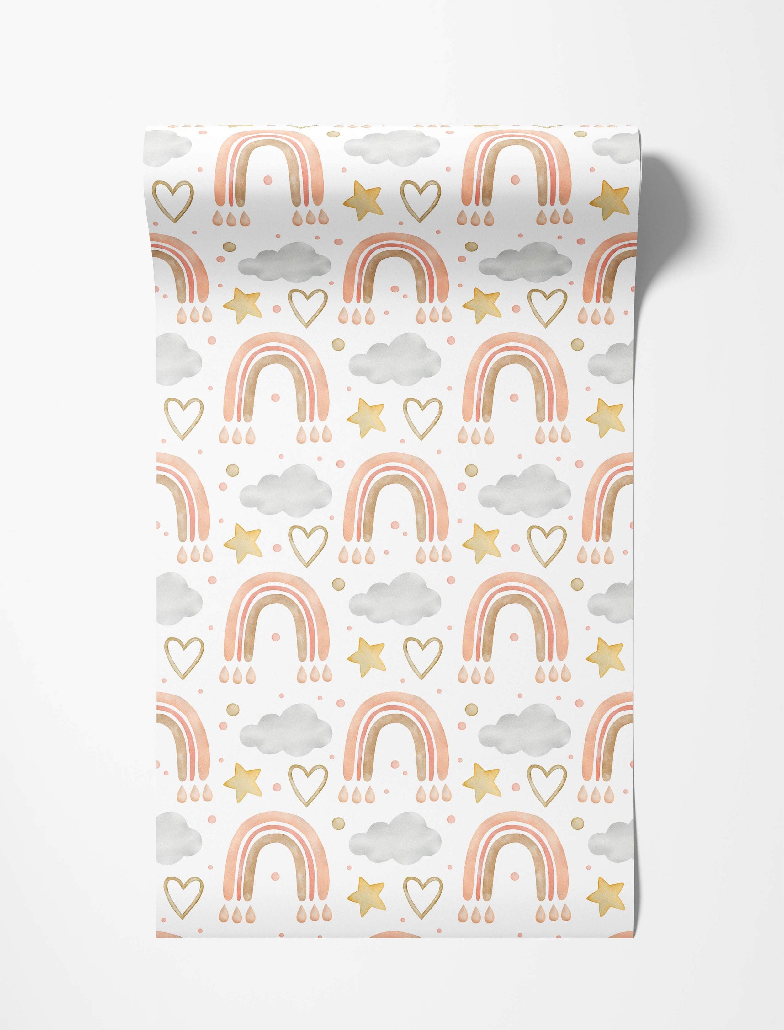 Watercolor wallpaper with a repeating pattern of peach and brown rainbows, gold stars and hearts, and gray clouds on white.