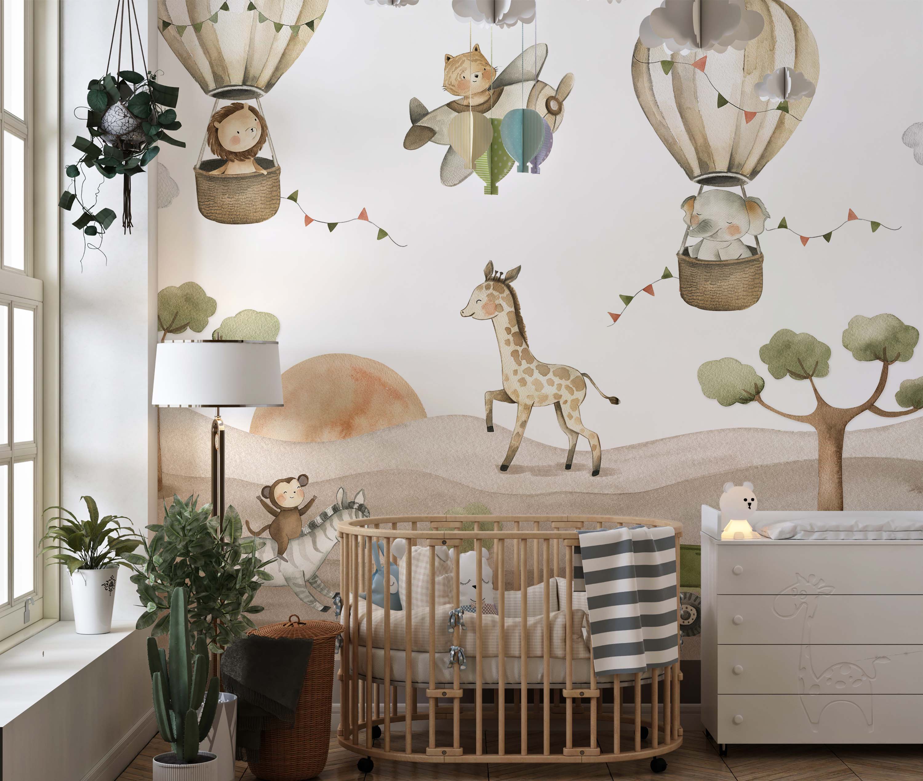 Mural of a whimsical safari scene with a giraffe, monkey, lion, and elephant in hot air balloons and an airplane in soft, earthy tones.