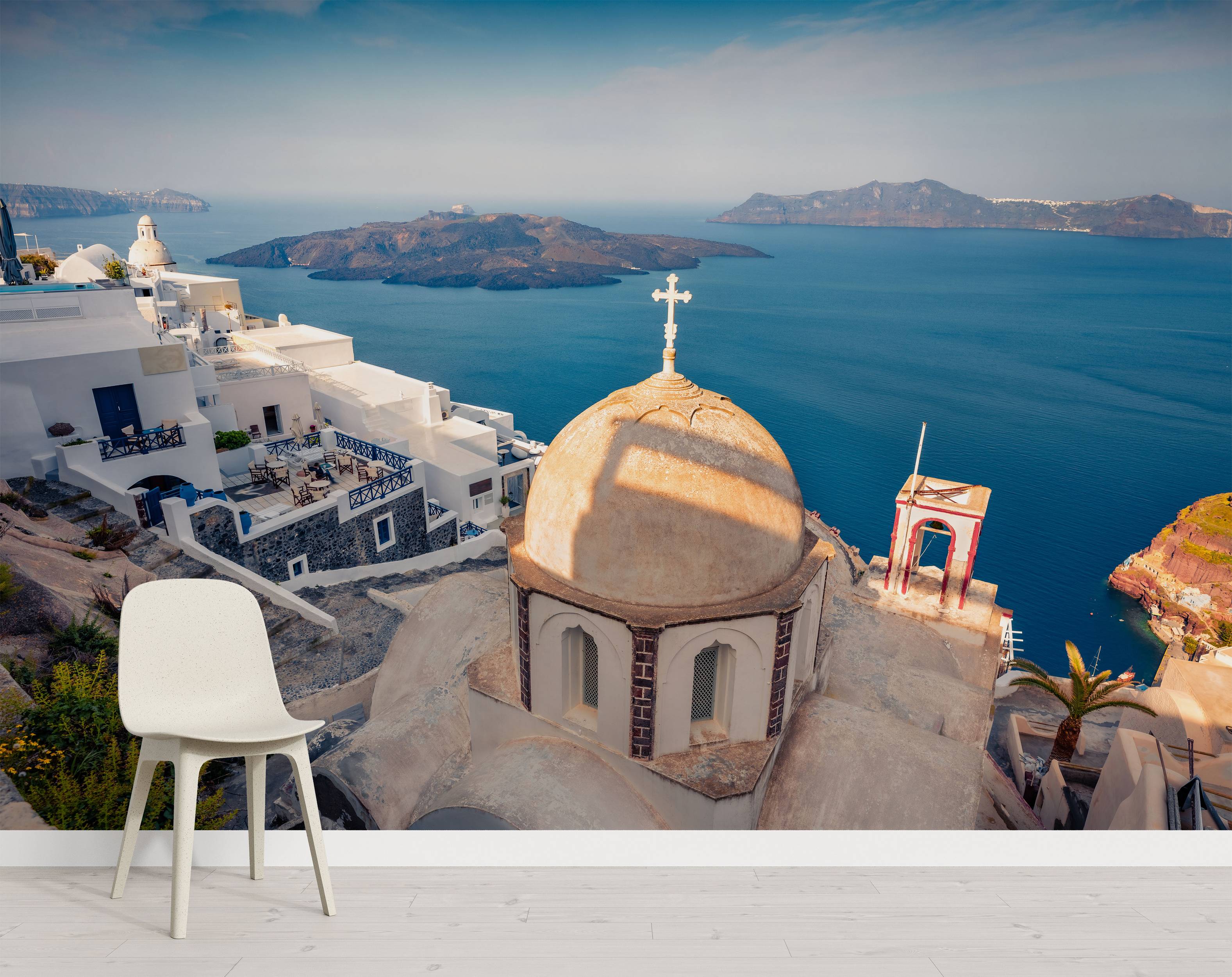 Photographic mural of Santorini, featuring classic white buildings, a church dome, and the deep blue Aegean Sea.