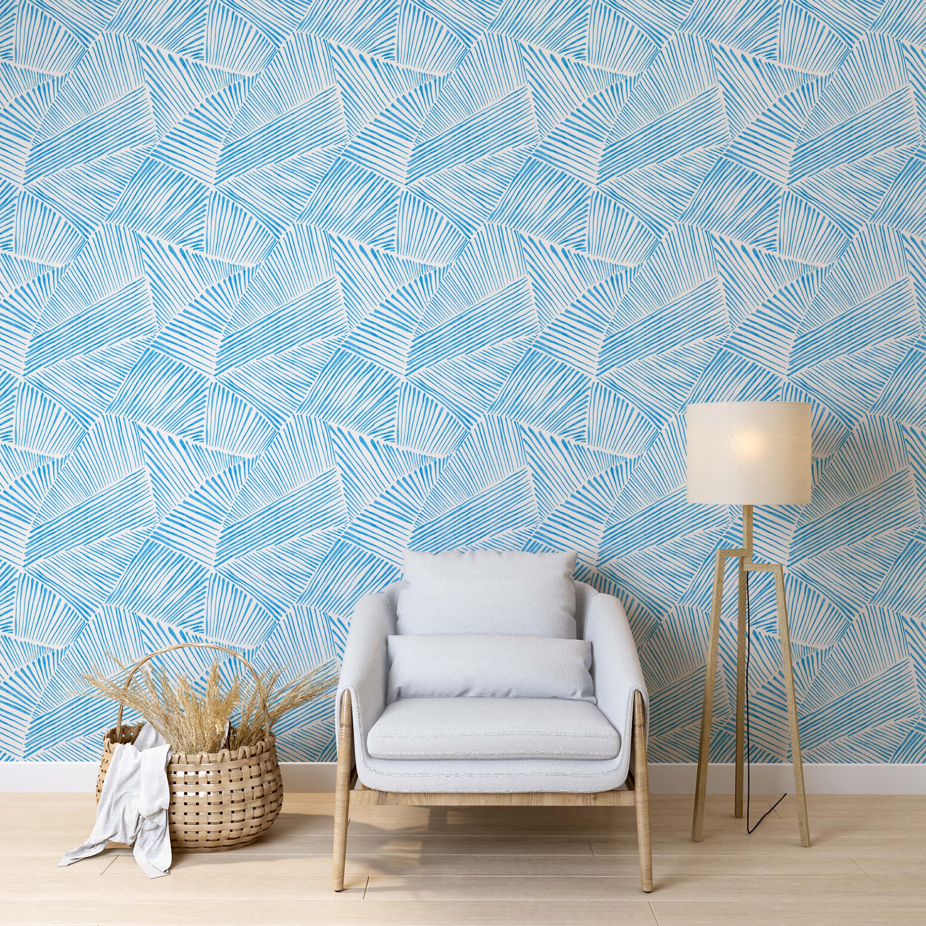 Blue and white wallpaper featuring a sketchy, hand-drawn pattern of lines forming abstract geometric blocks.