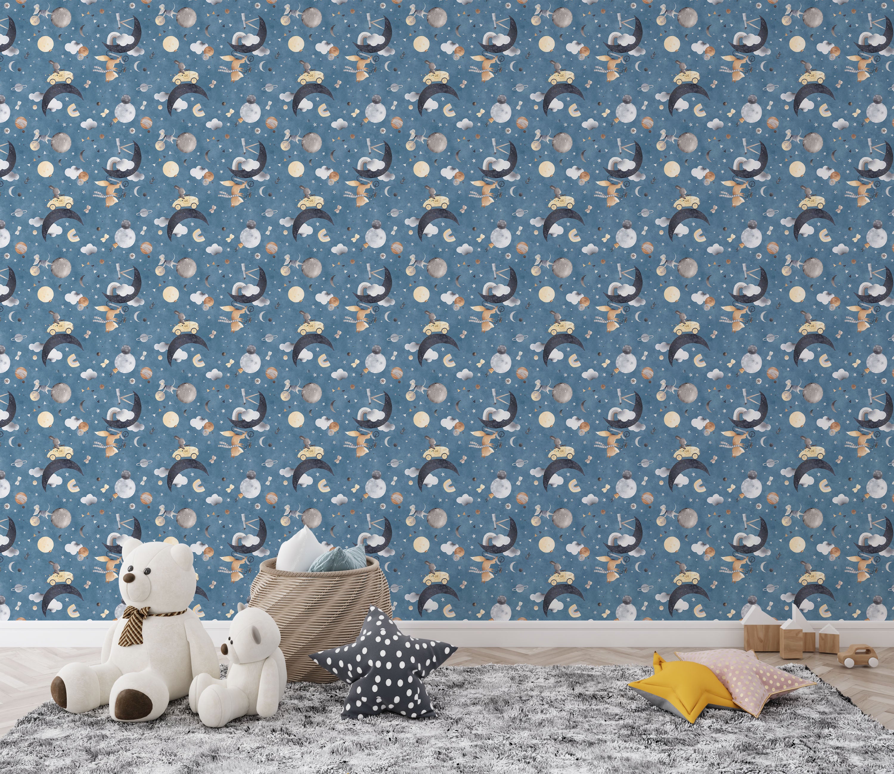 Whimsical children's wallpaper with watercolor rabbits, moons, planets, stars, and clouds on a blue, starry background.