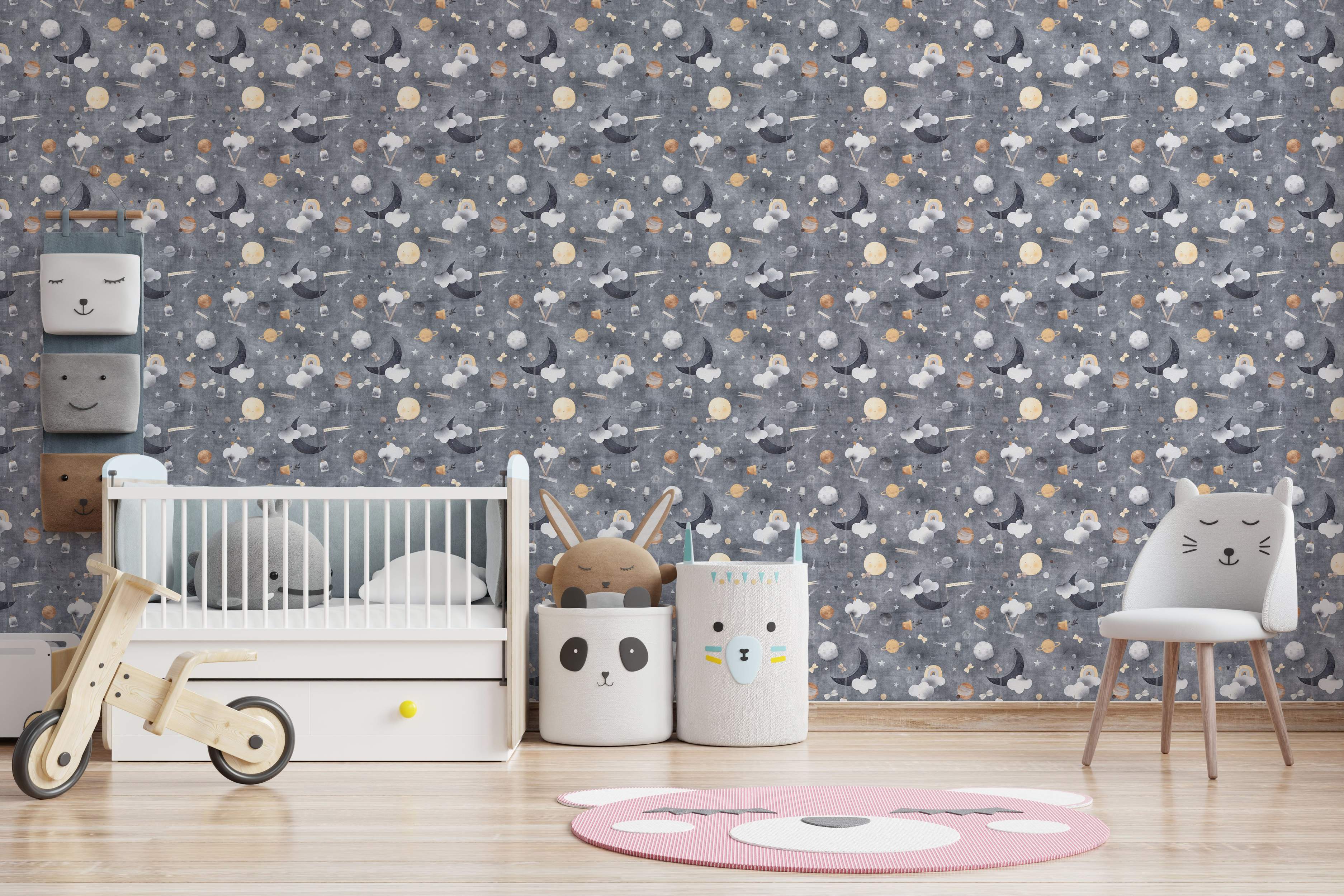 Children's wallpaper with illustrated moons, planets, and clouds in yellow and white on a textured gray backdrop.