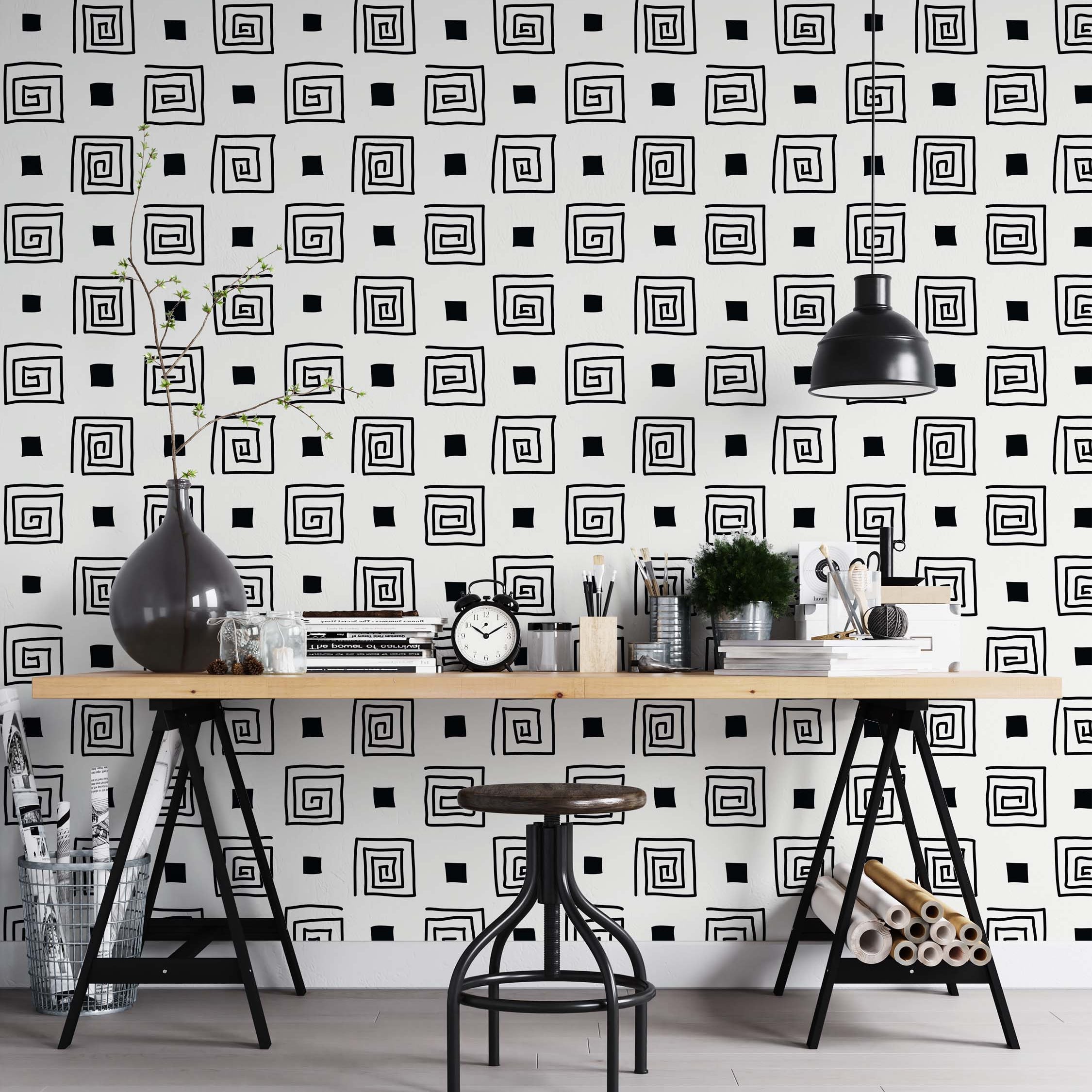 Wallpaper featuring a repeating pattern of sketched black squares and square spirals alternating on a white background.
