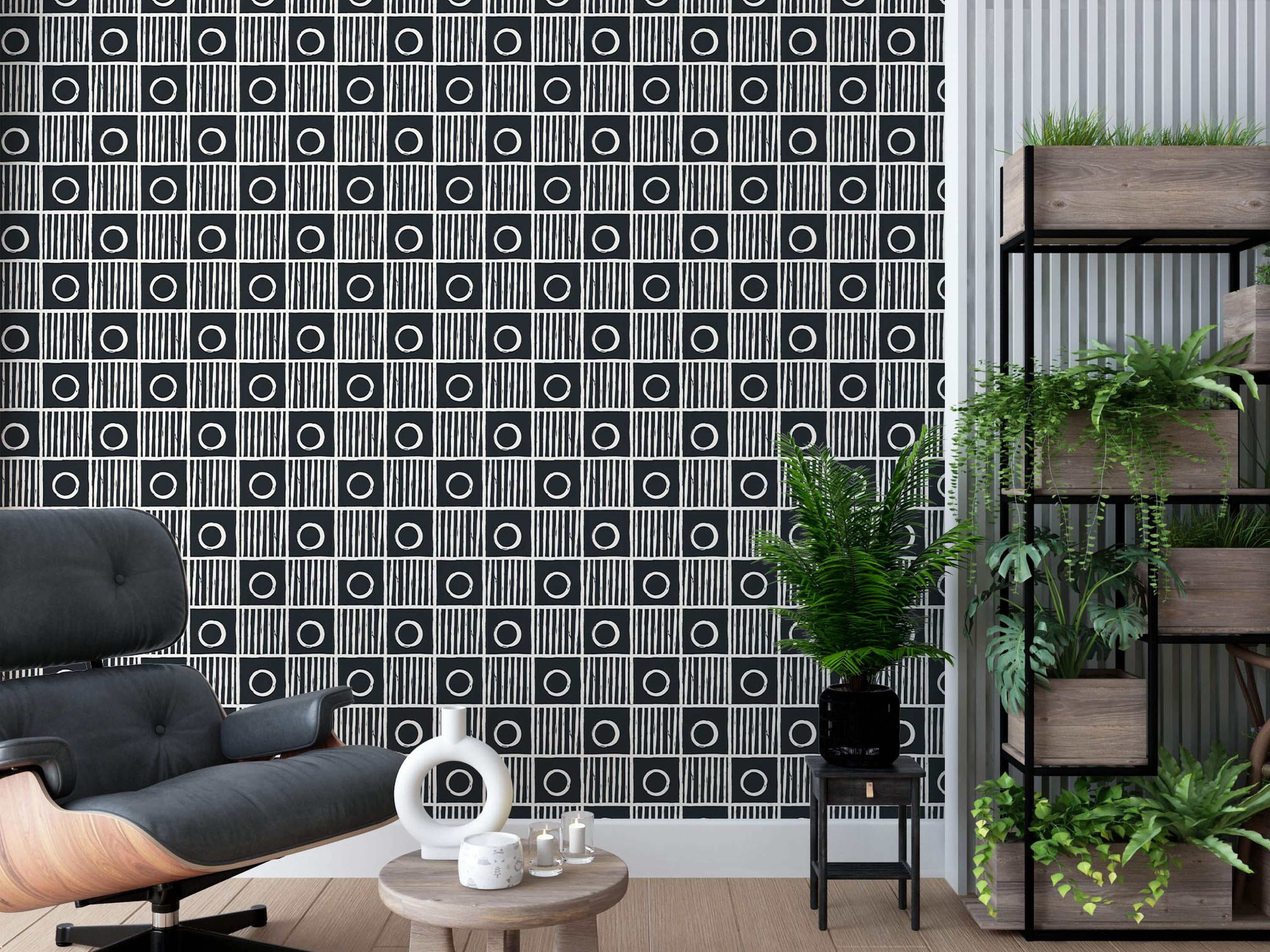Black and white wallpaper displaying a geometric grid of squares, alternating between white circles and white stripes.