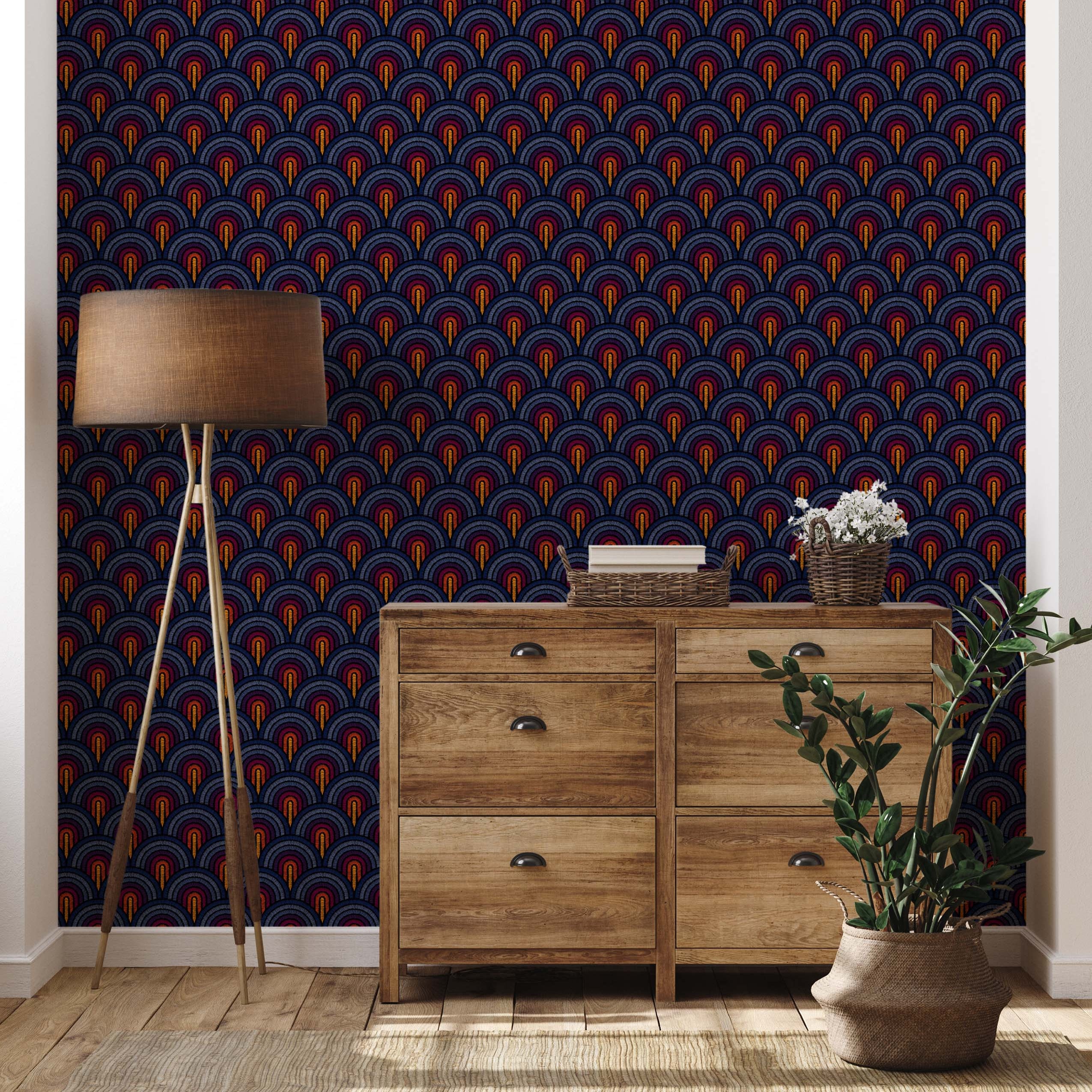 Wallpaper featuring a repeating pattern of embroidered, stacked arches in red, orange, and yellow, on a dark navy blue background.