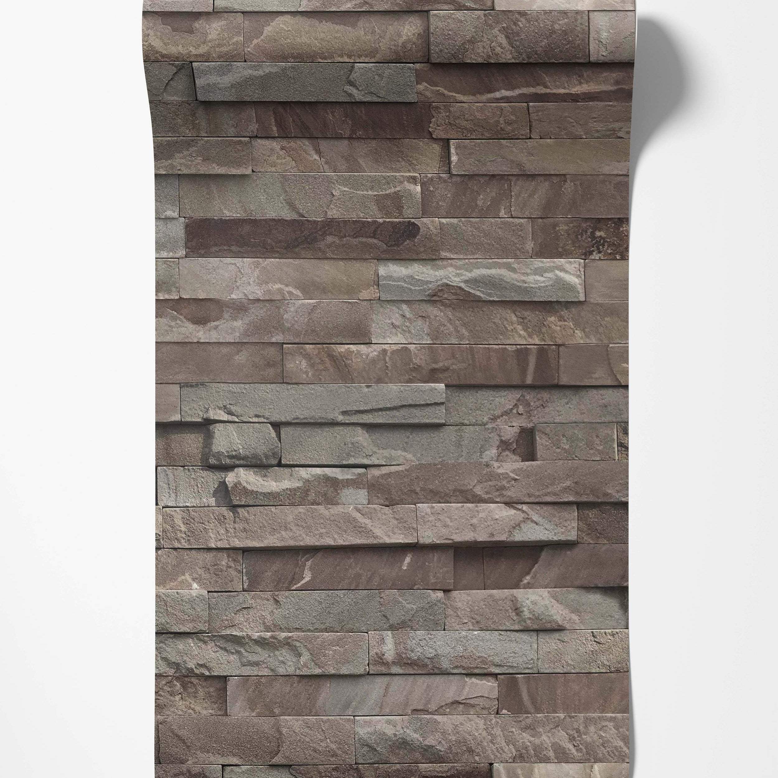 Wallpaper featuring a realistic stacked stone pattern with textured rectangular stones in brown, gray, and beige tones.