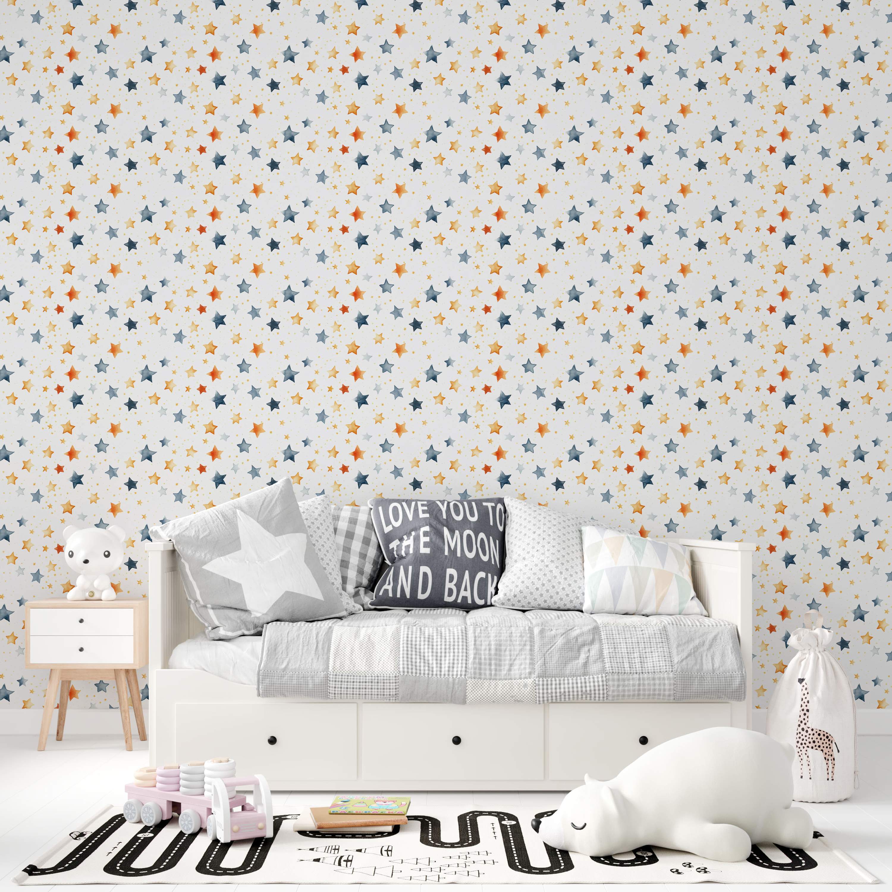 Wallpaper with a scattered pattern of blue, orange, and yellow watercolor stars in various sizes on a white background.