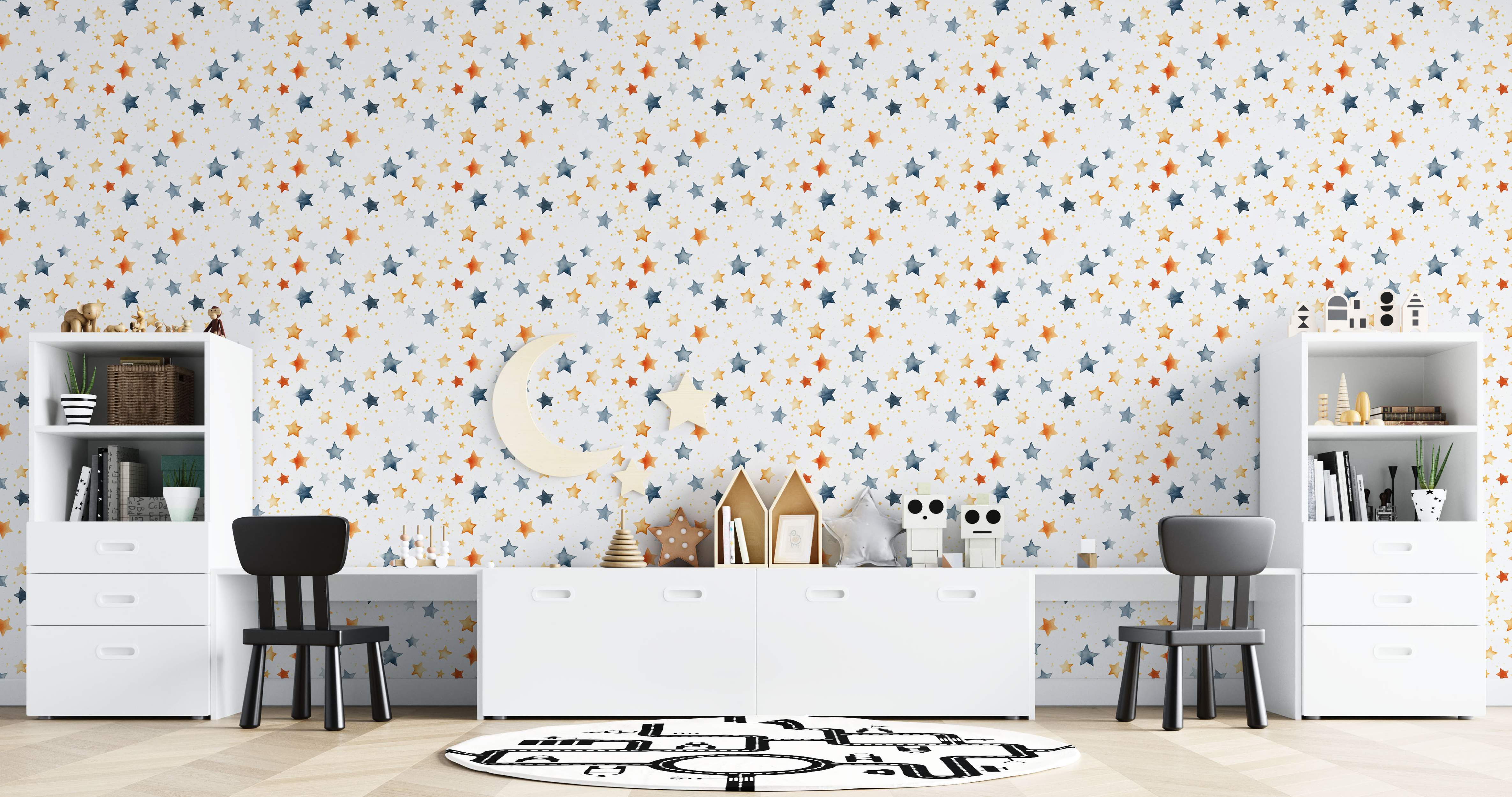 Wallpaper with a scattered pattern of watercolor stars in orange, blue, and yellow on white.