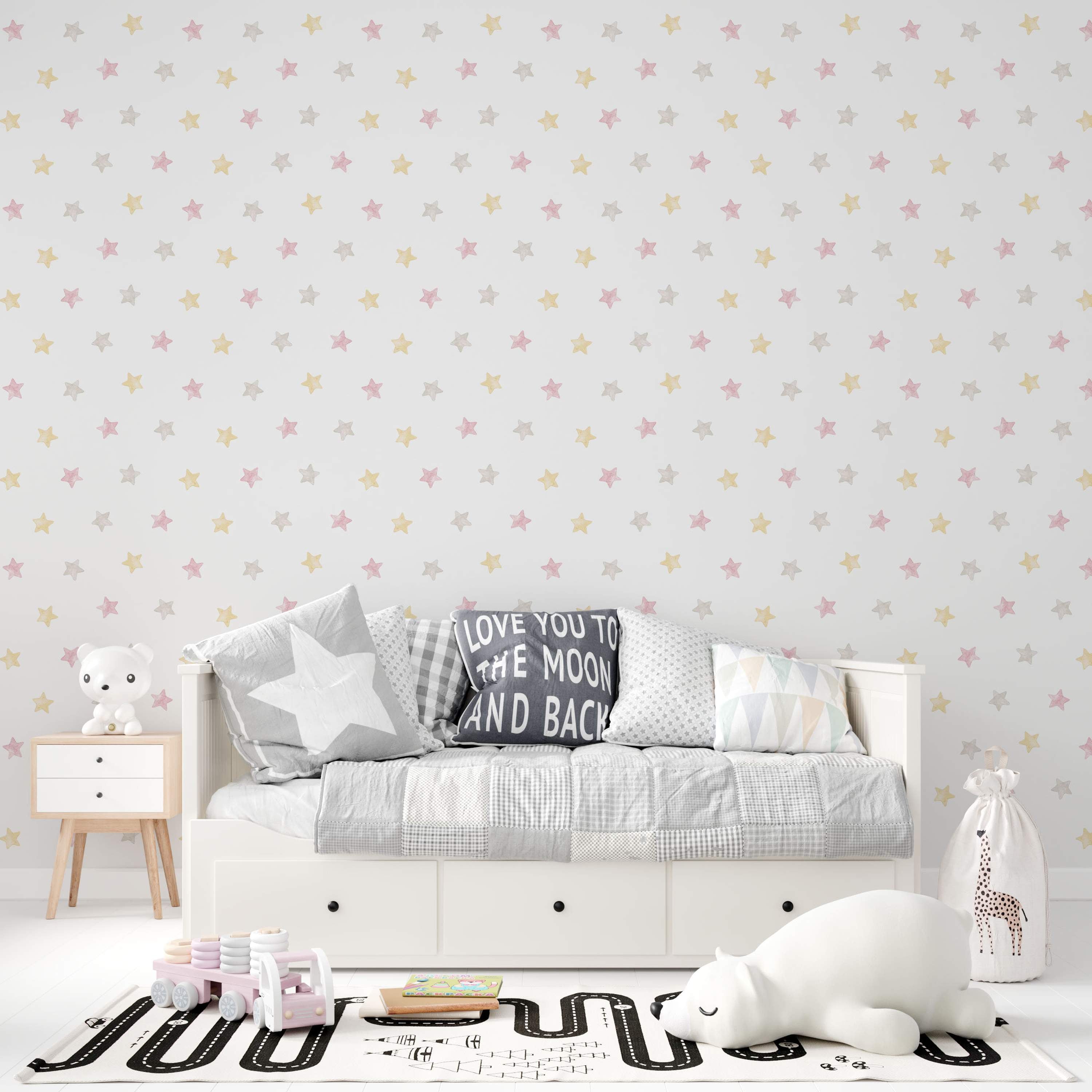 Wallpaper featuring a repeating pattern of small, soft pink, yellow, and gray stars on a white background.