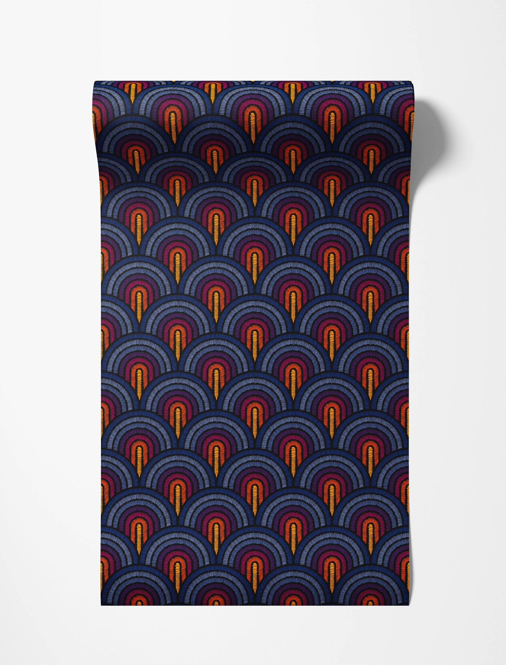 Wallpaper featuring an Art Deco repeating pattern of stitched arched scales in vibrant blue, purple, red, orange, and yellow on a dark ground.