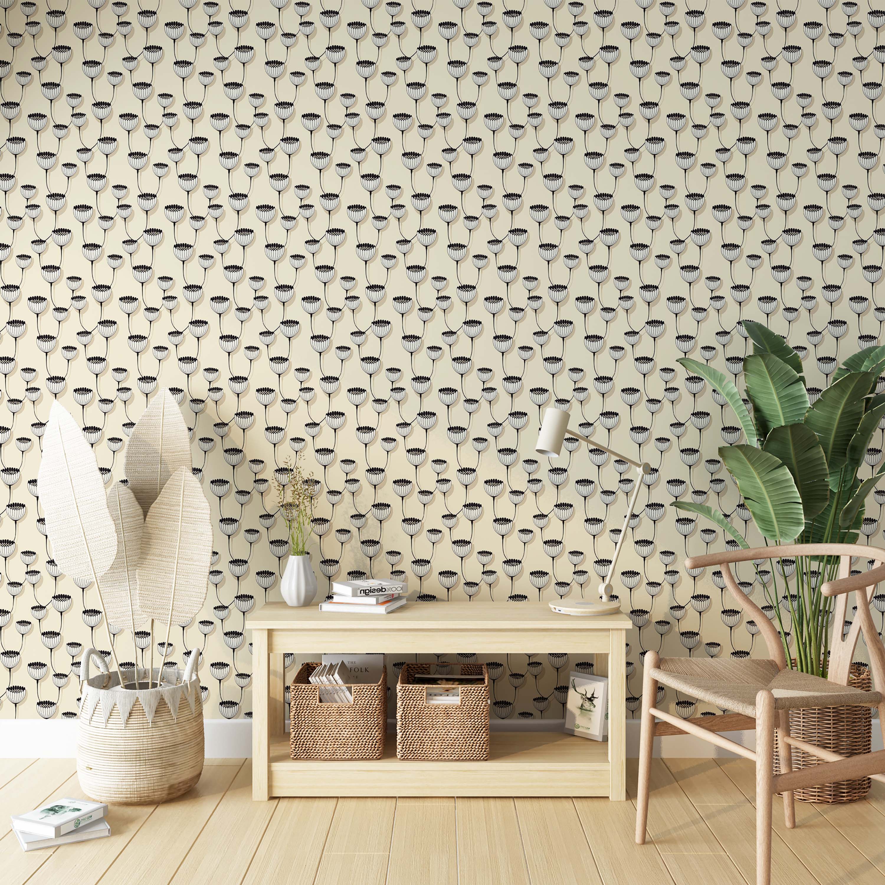 A wallpaper with a stylized pattern of black and white flower heads on branching stems, set against a cream background.