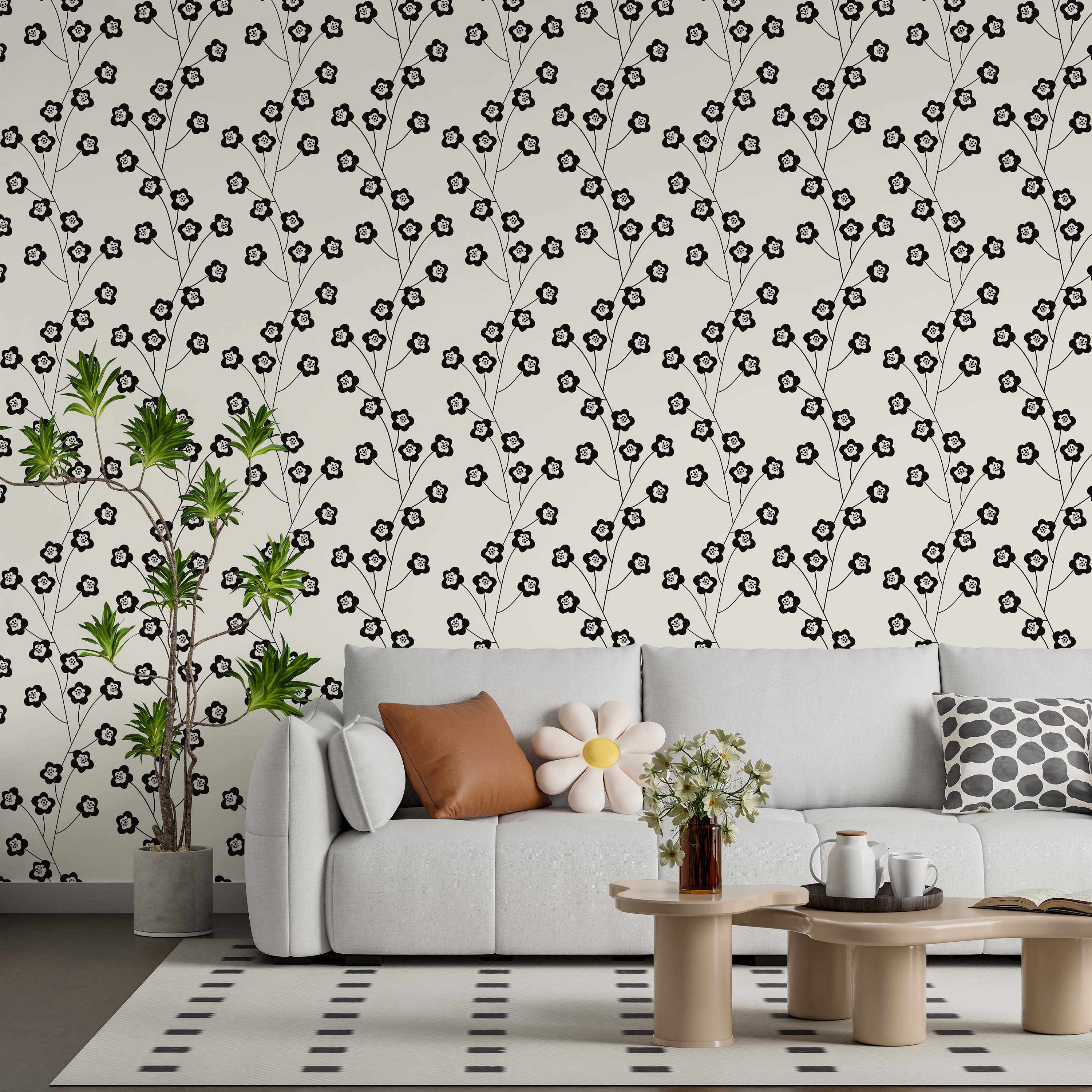 Stylized black floral branches wallpaper with white, black-dotted flower centers, repeating on an off-white background.