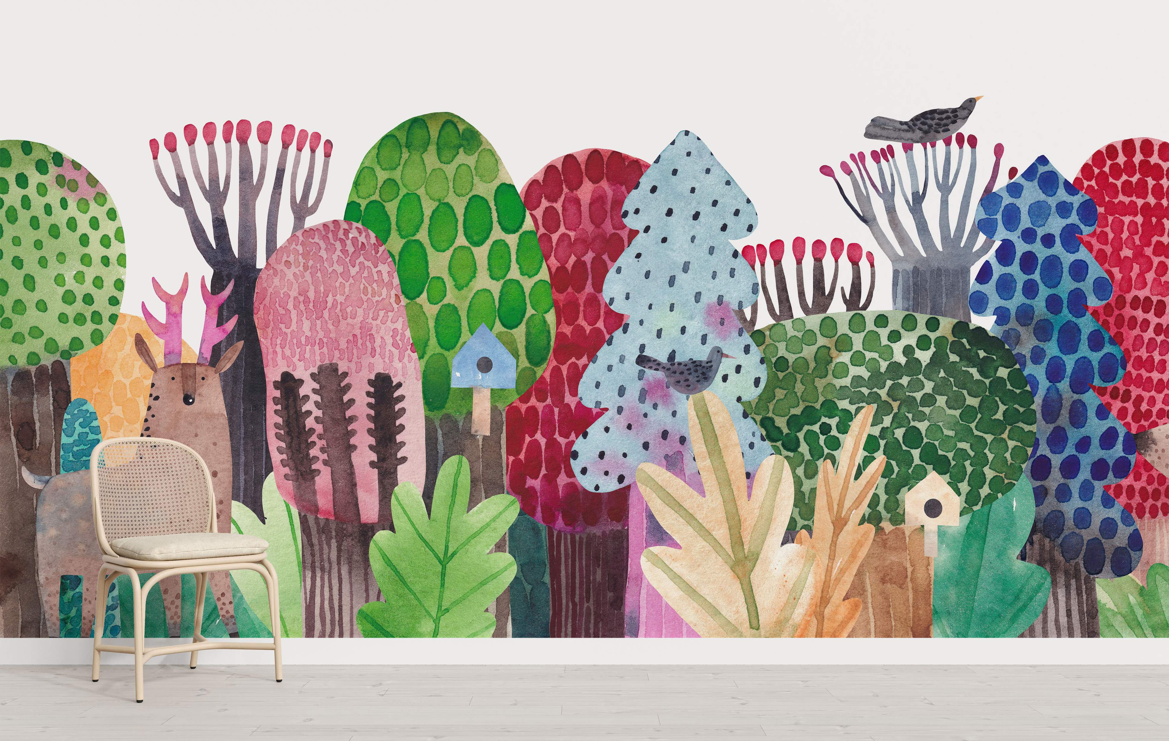 Whimsical watercolor forest mural featuring colorful, patterned trees, stylized plants, a deer, birds, and small birdhouses.
