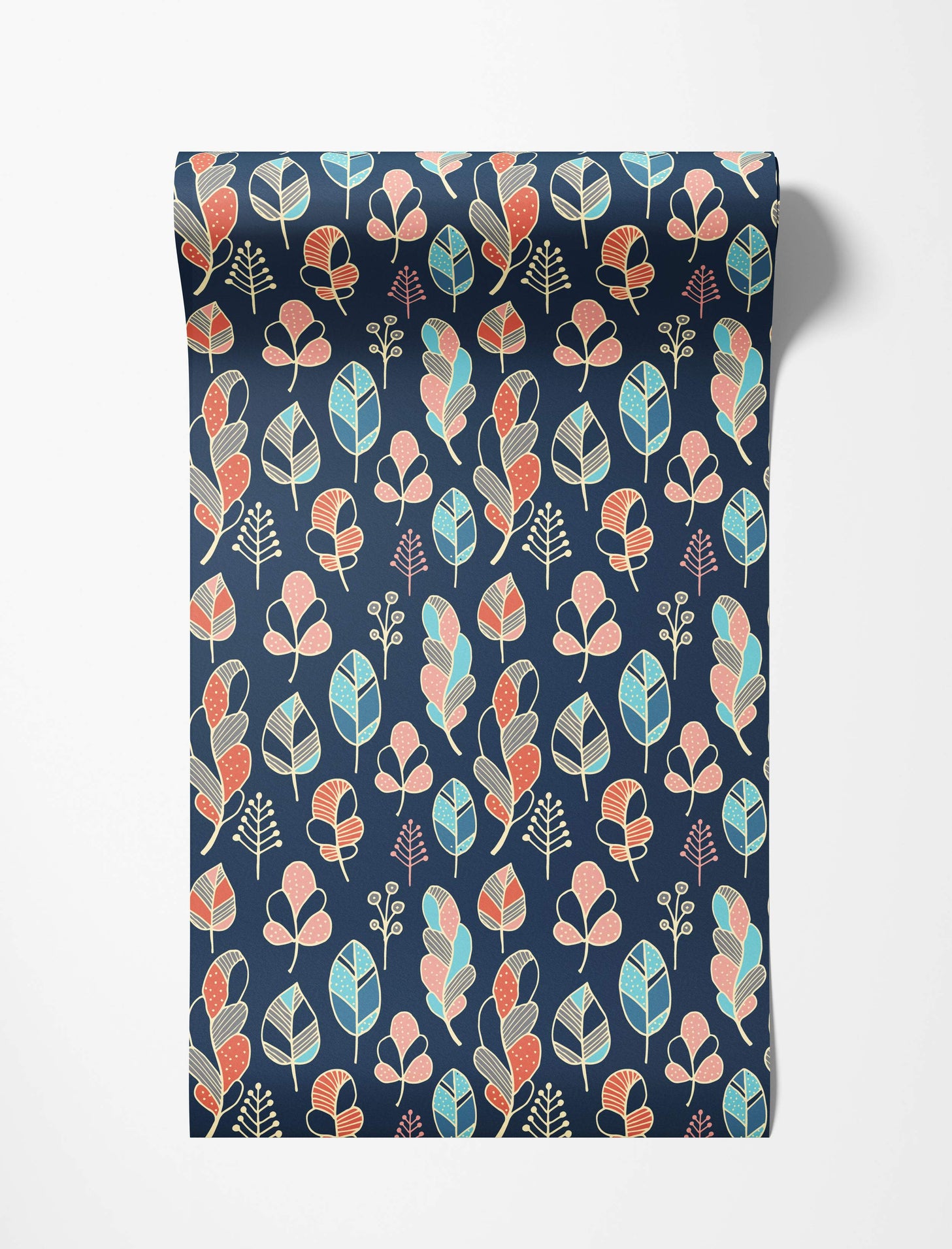 Wallpaper featuring stylized leaves and sprigs in coral, pink, blue, and gray with cream outlines on a dark navy blue background.