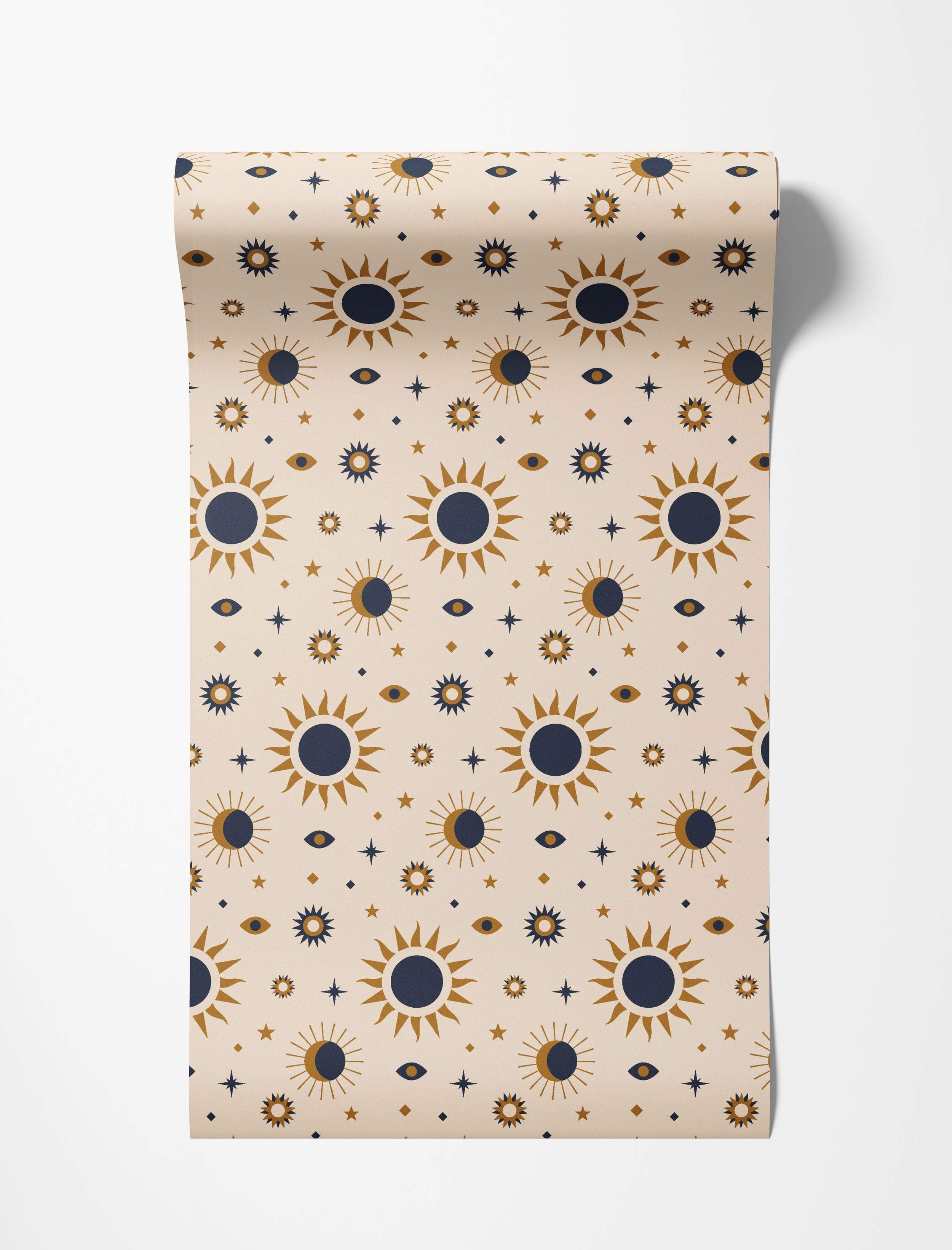 Beige wallpaper with sun, star, and eye patterns in blue and gold.