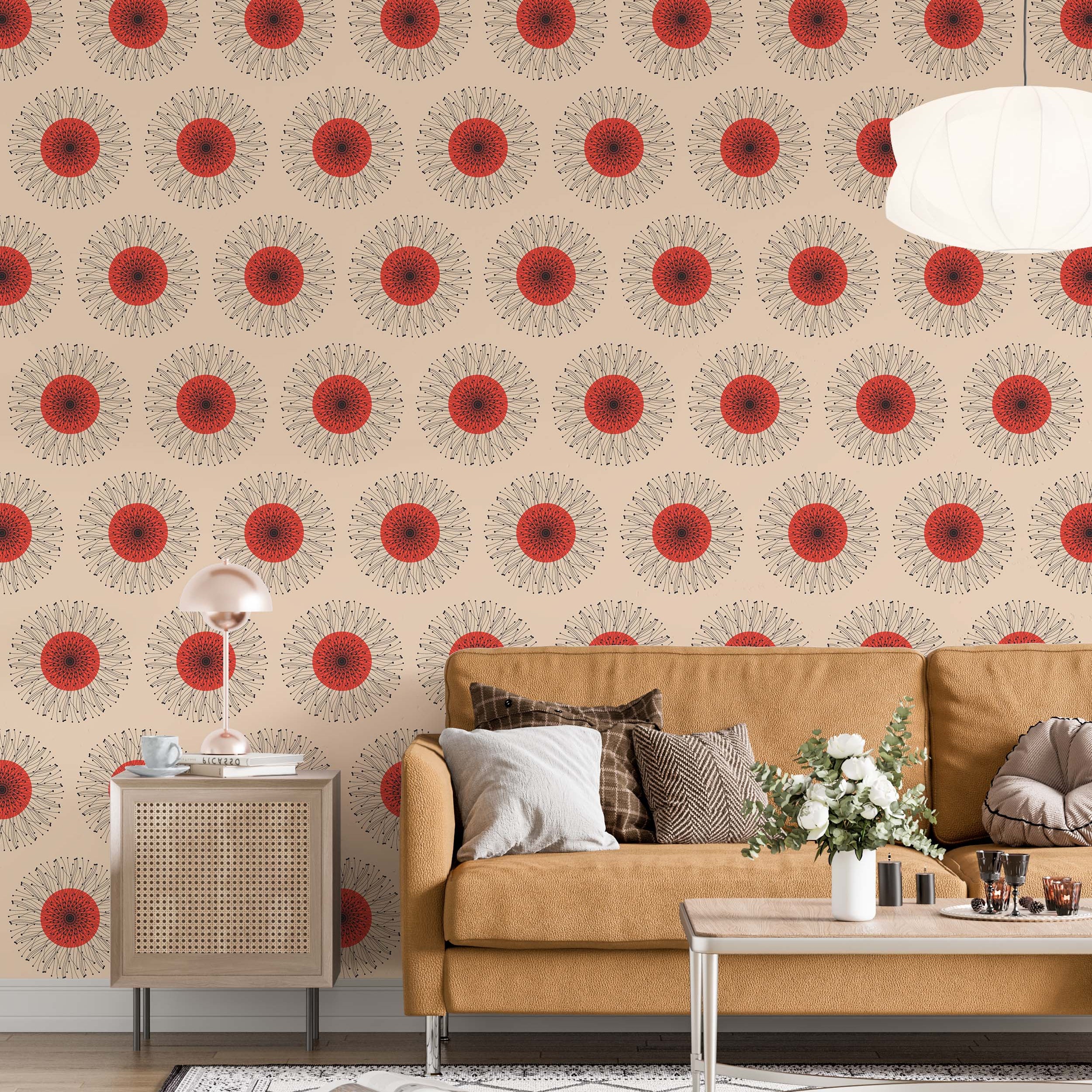 A retro wallpaper featuring repeating sunburst medallions with red centers and radiating black dotted lines on a tan background.