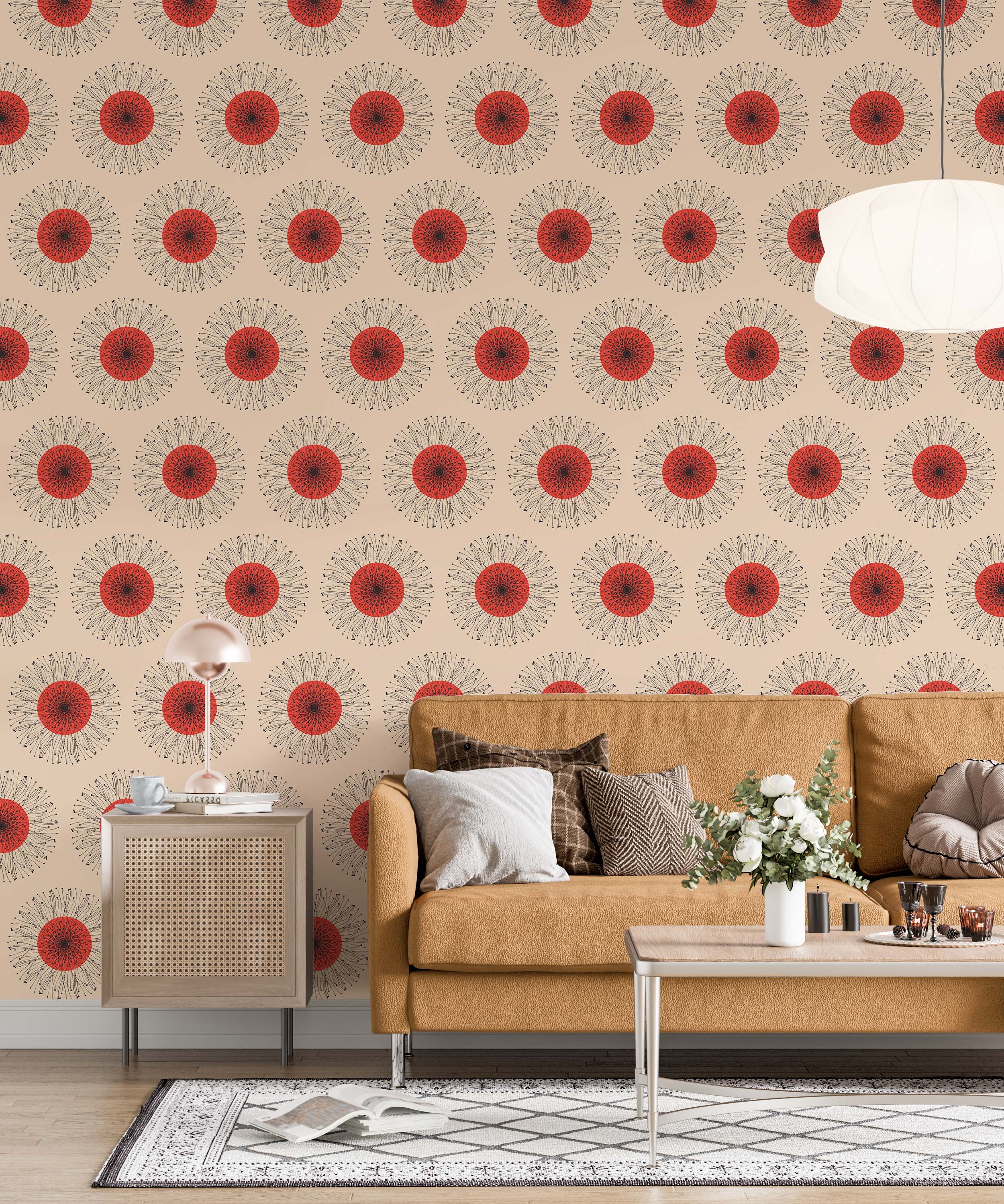 A retro wallpaper featuring repeating sunburst medallions with red centers and radiating black dotted lines on a tan background.