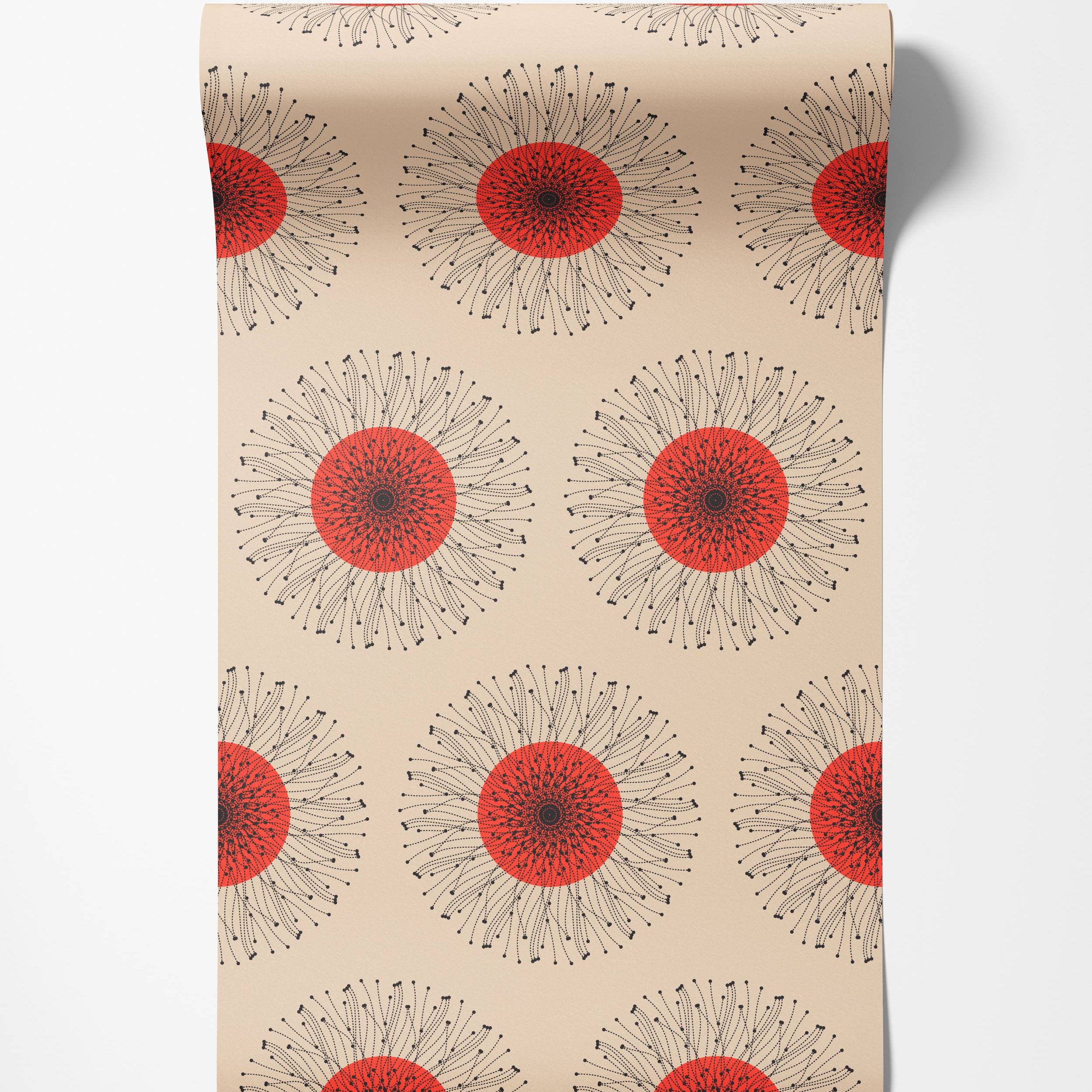 Wallpaper with a pattern of stylized red sunbursts with radiating black dotted lines on a beige background.