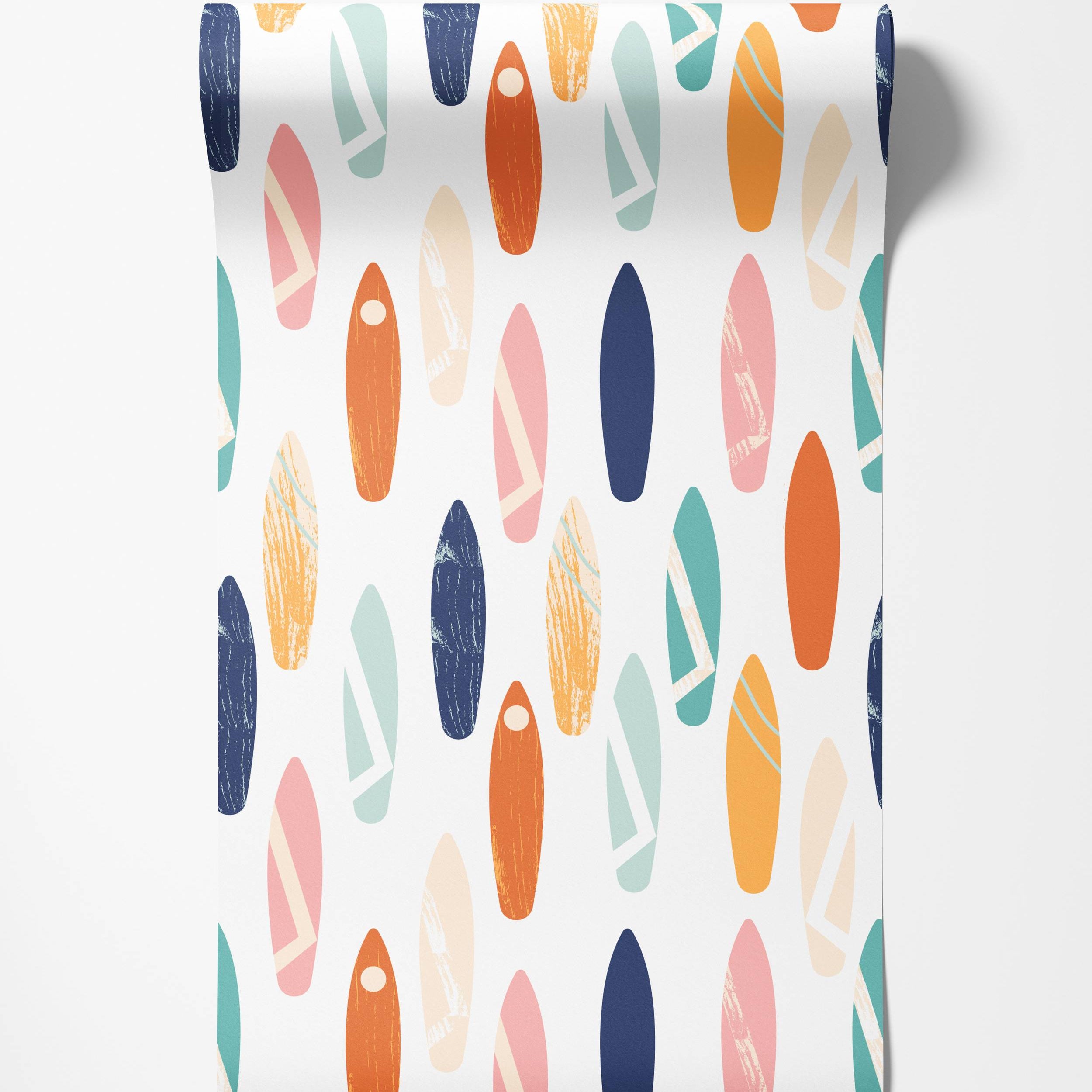 Wallpaper with a repeating pattern of stylized surfboards in shades of blue, orange, pink, teal, and light beige on a white background.