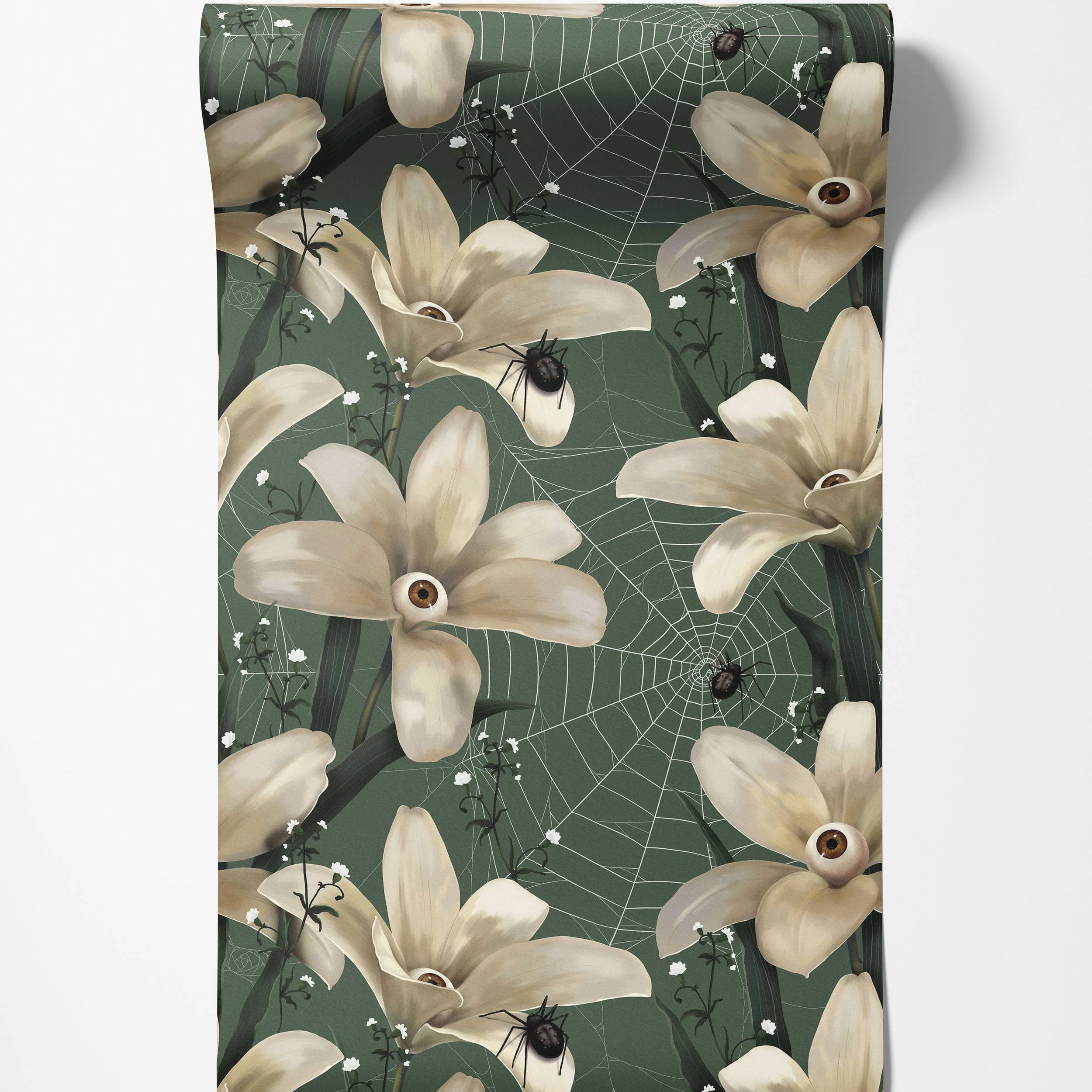 Surreal wallpaper with off-white flowers with eyeballs, black spiders, and webs on a dark green background.