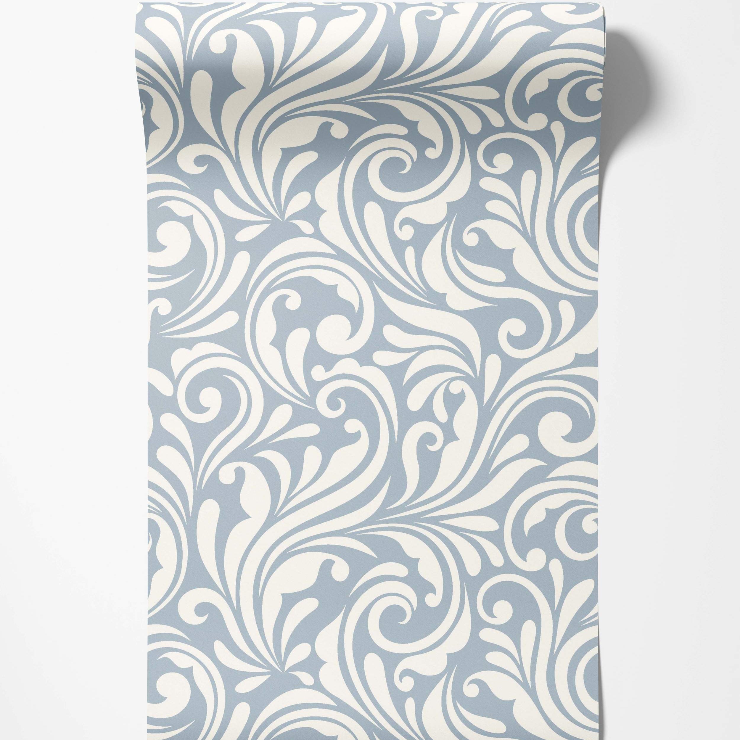 Wallpaper featuring a dense pattern of swirling cream scrolls and flourishes on a light blue background.