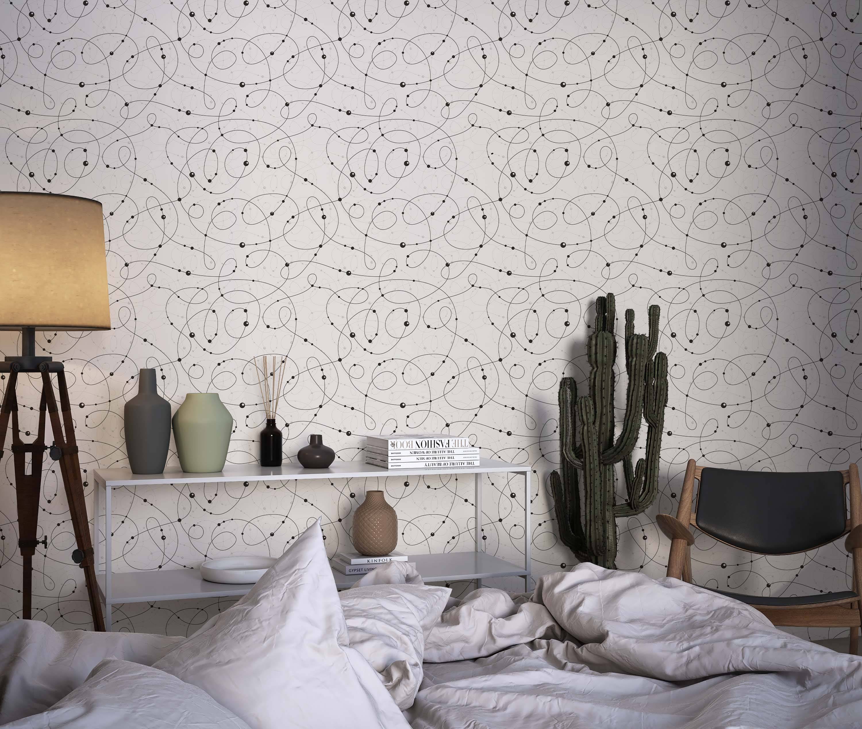 Abstract wallpaper with swirling black lines and dots, accented by faint grey lines on a light grey background.
