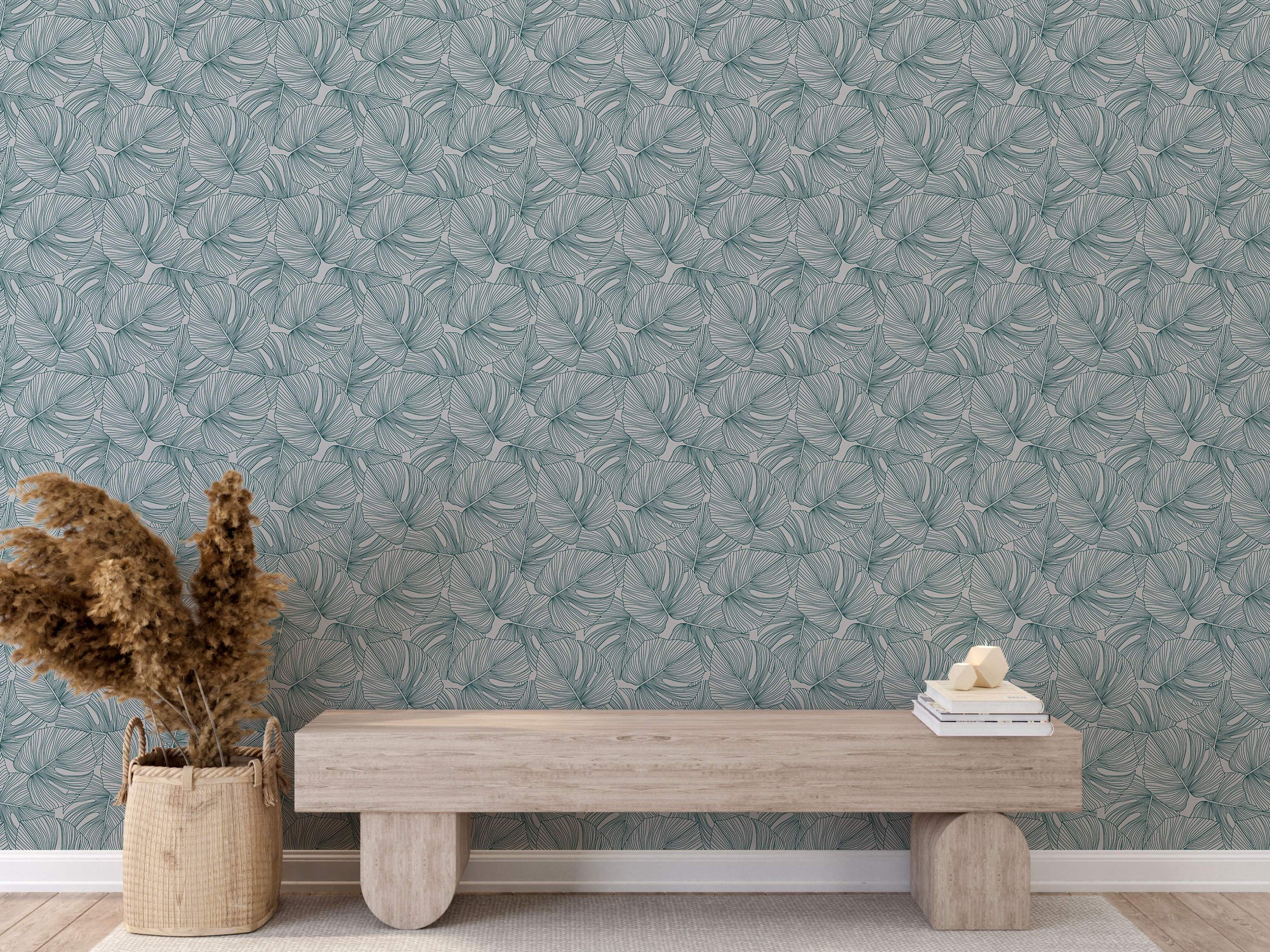 Wallpaper featuring overlapping, stylized leaves in teal green line art against a pale gray background.