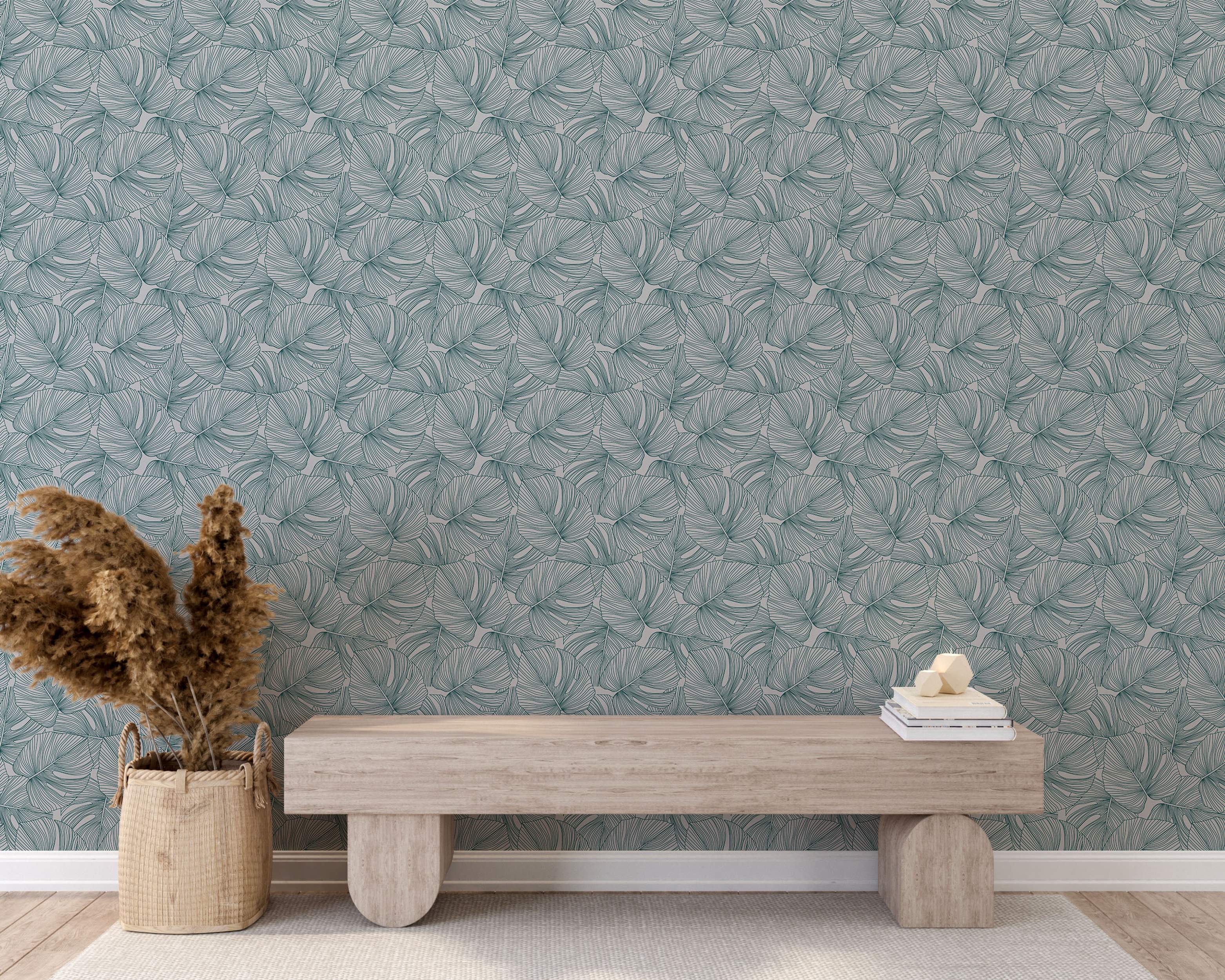 Wallpaper featuring overlapping, stylized leaves in teal green line art against a pale gray background.