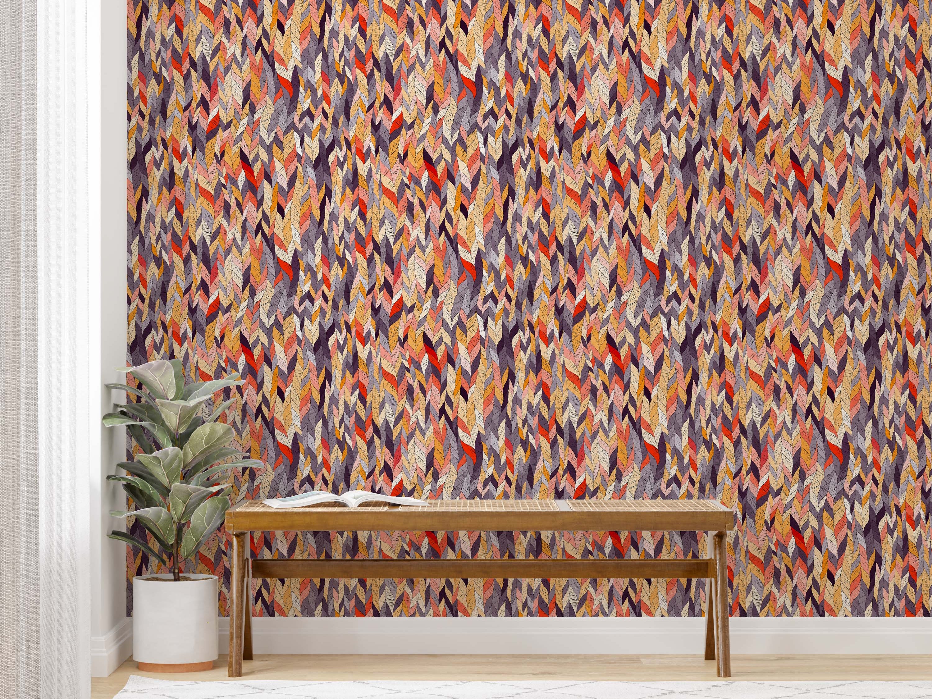 Wallpaper with a dense, textured pattern of overlapping, stylized leaves in warm reds, oranges, yellows, purples, and grays.