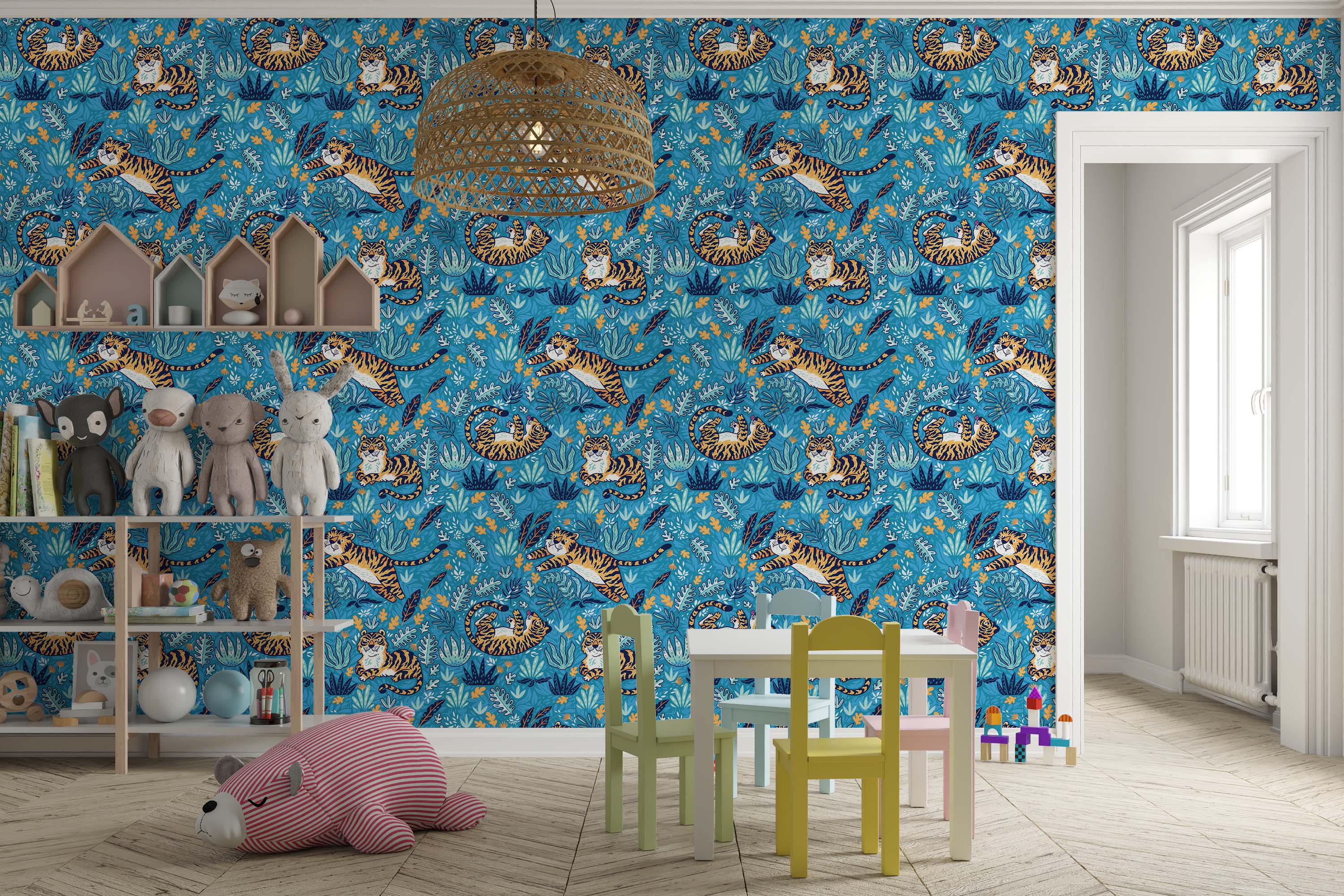 A playful wallpaper with cartoon tigers in various poses among blue, teal, and yellow jungle leaves on a bright blue background.