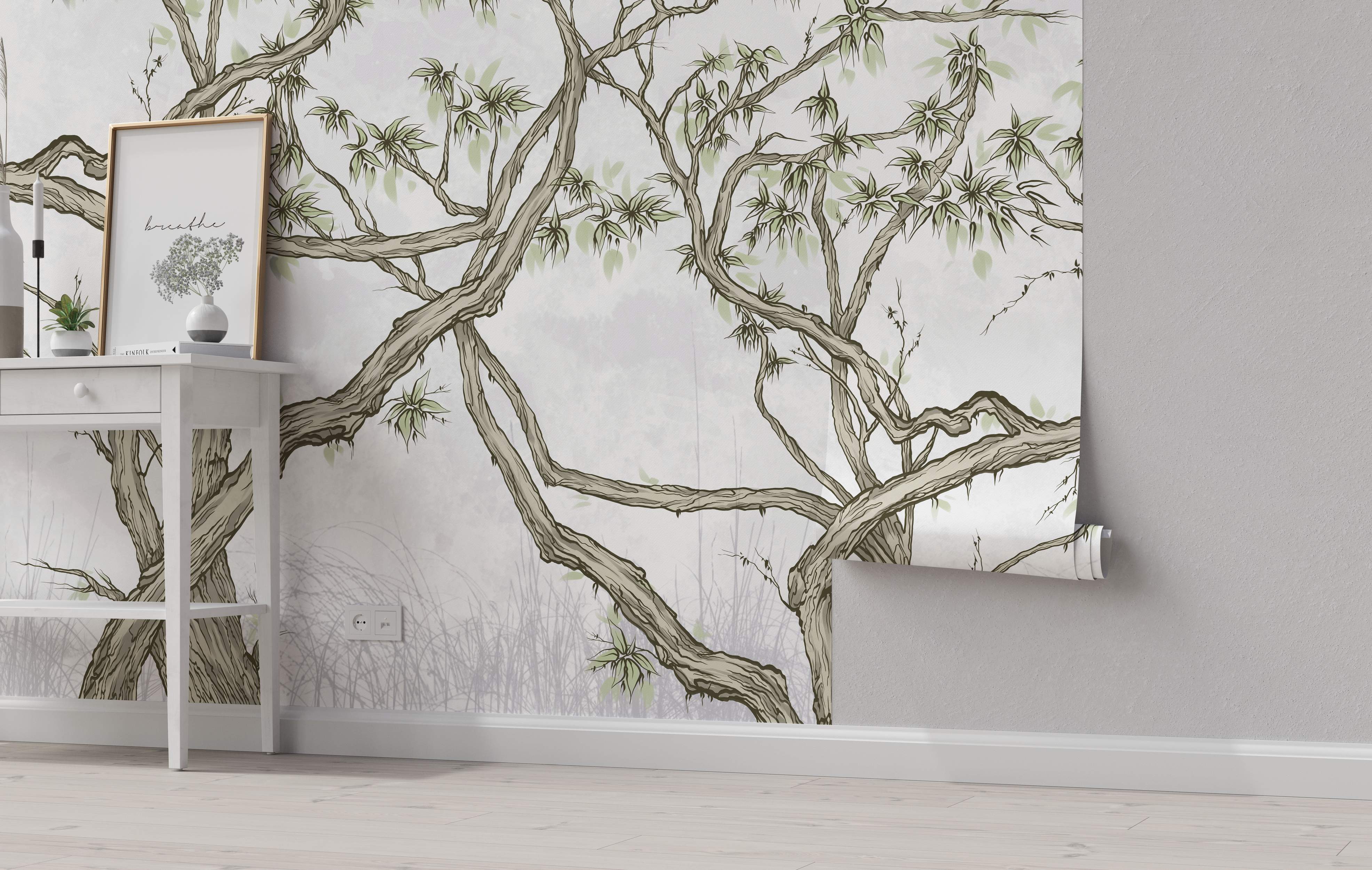 Wall mural showing a stylized tree design with twisting brown branches, light green leaves, and a subtle gray background.