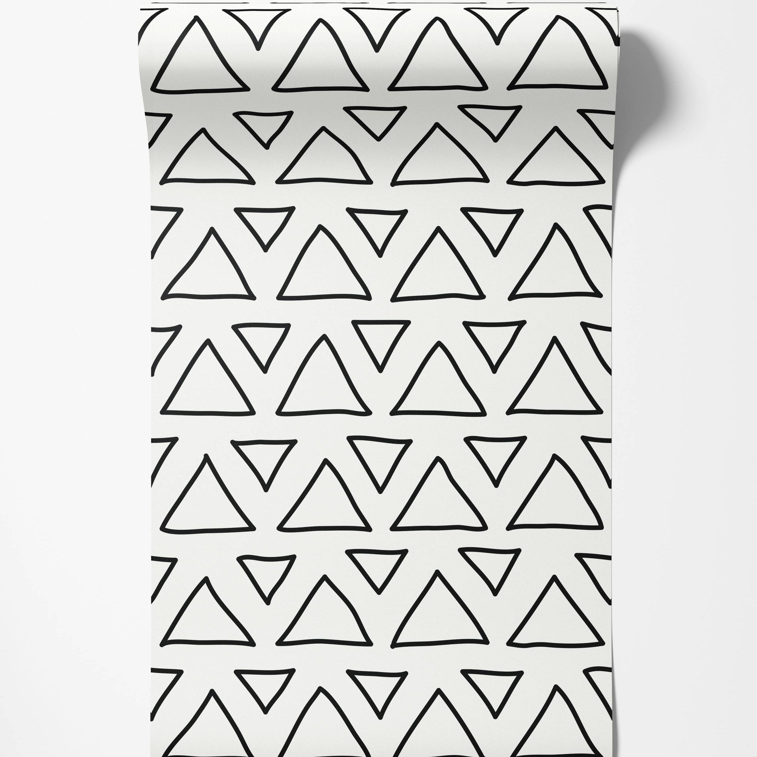 Wallpaper with a hand-drawn pattern of black outlined triangles arranged irregularly on a white background.