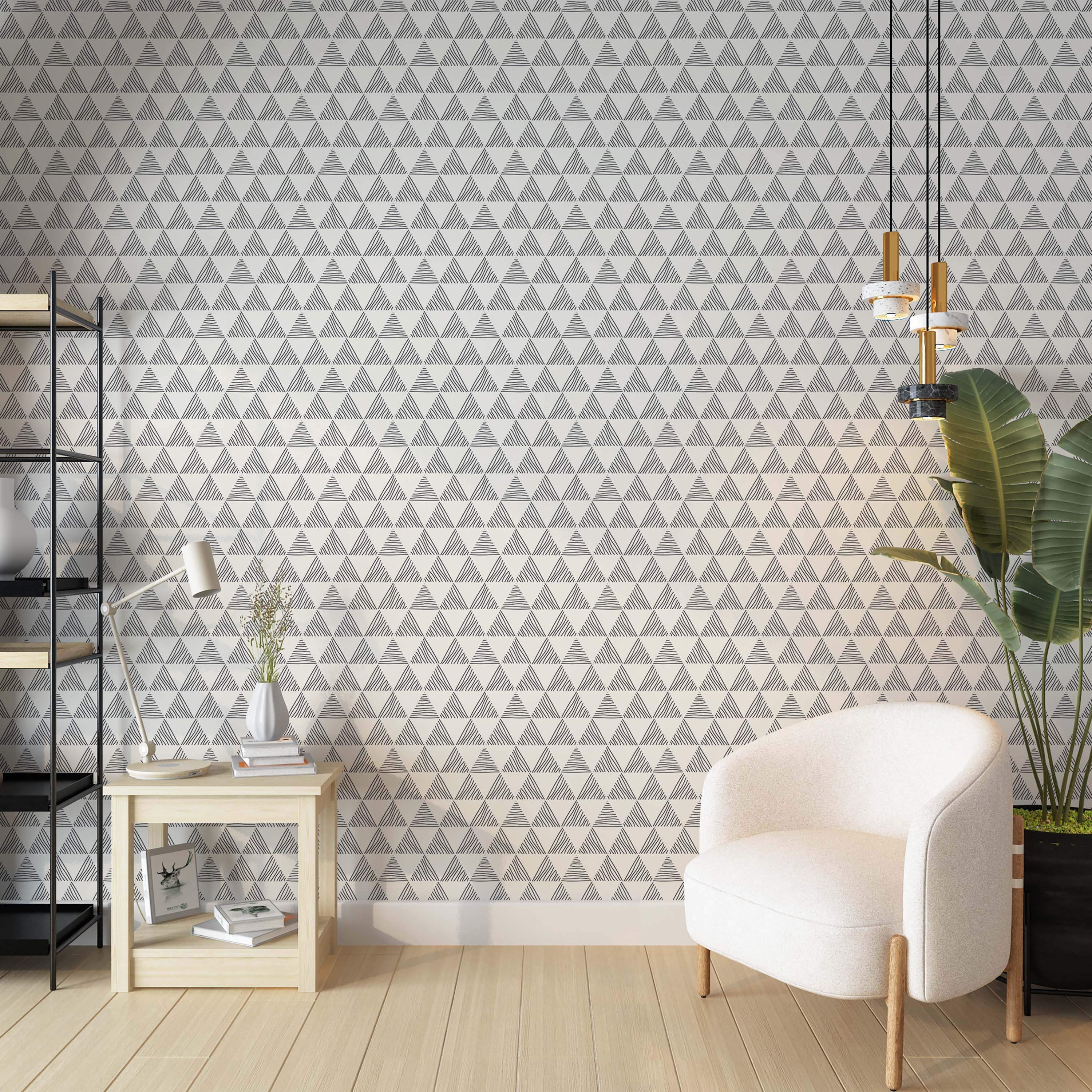 Geometric wallpaper featuring repeating hand-drawn triangles with internal line patterns in dark gray on an off-white background.