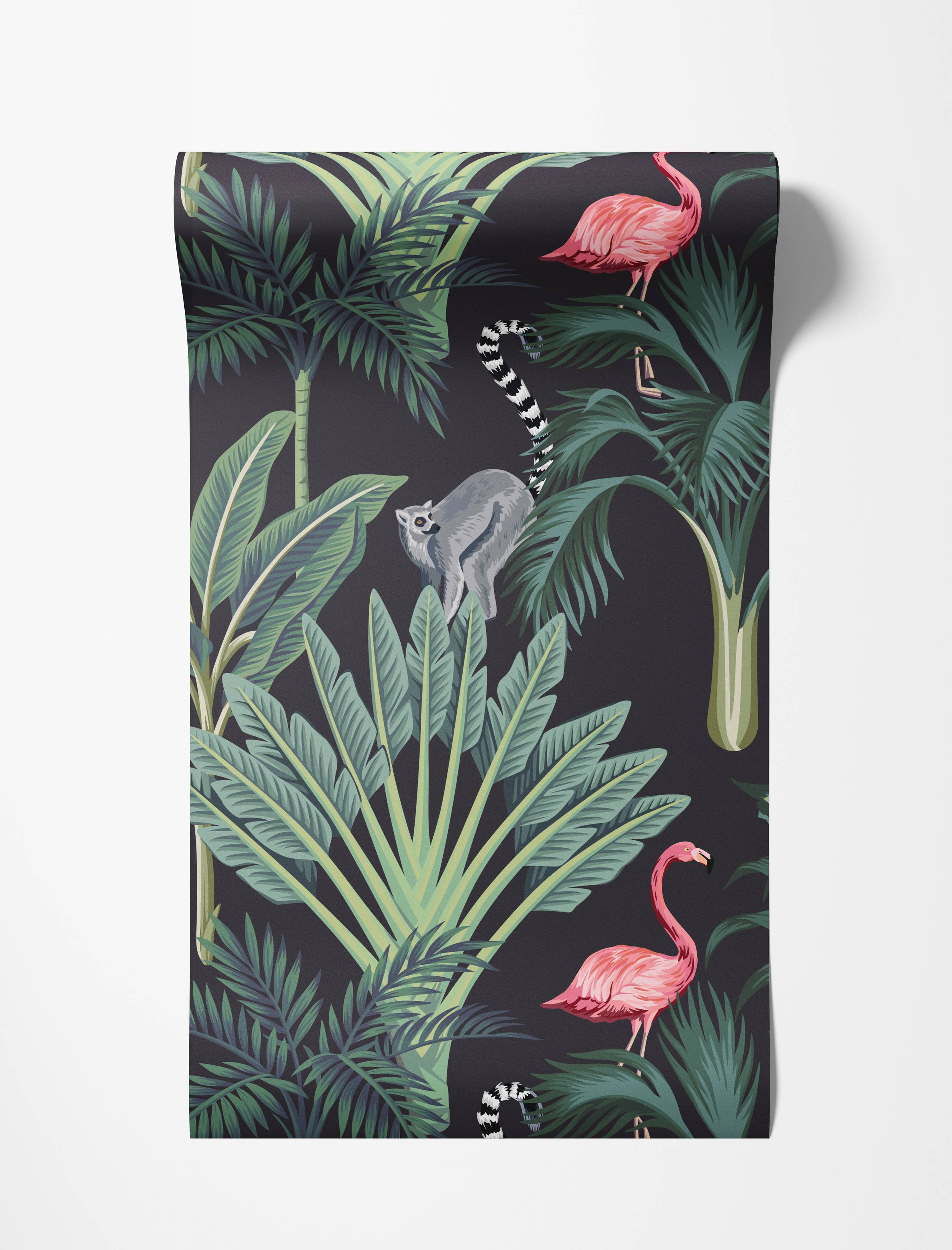 Tropical wallpaper with pink flamingos, a ring-tailed lemur, and green palm leaves on a dark charcoal background.