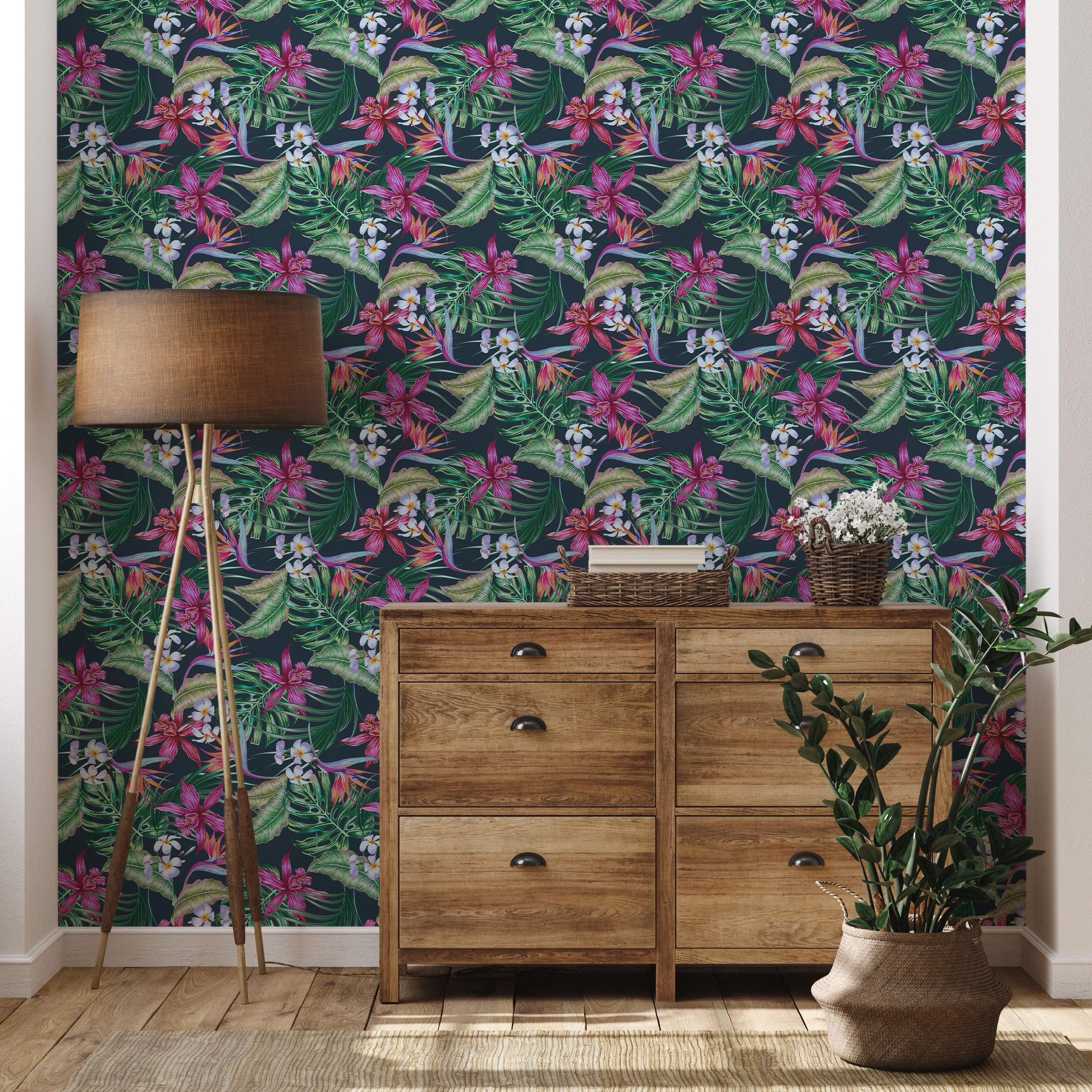 Tropical wallpaper featuring vibrant pink, purple, and white flowers like orchids and plumeria, with green leaves on a dark navy background.
