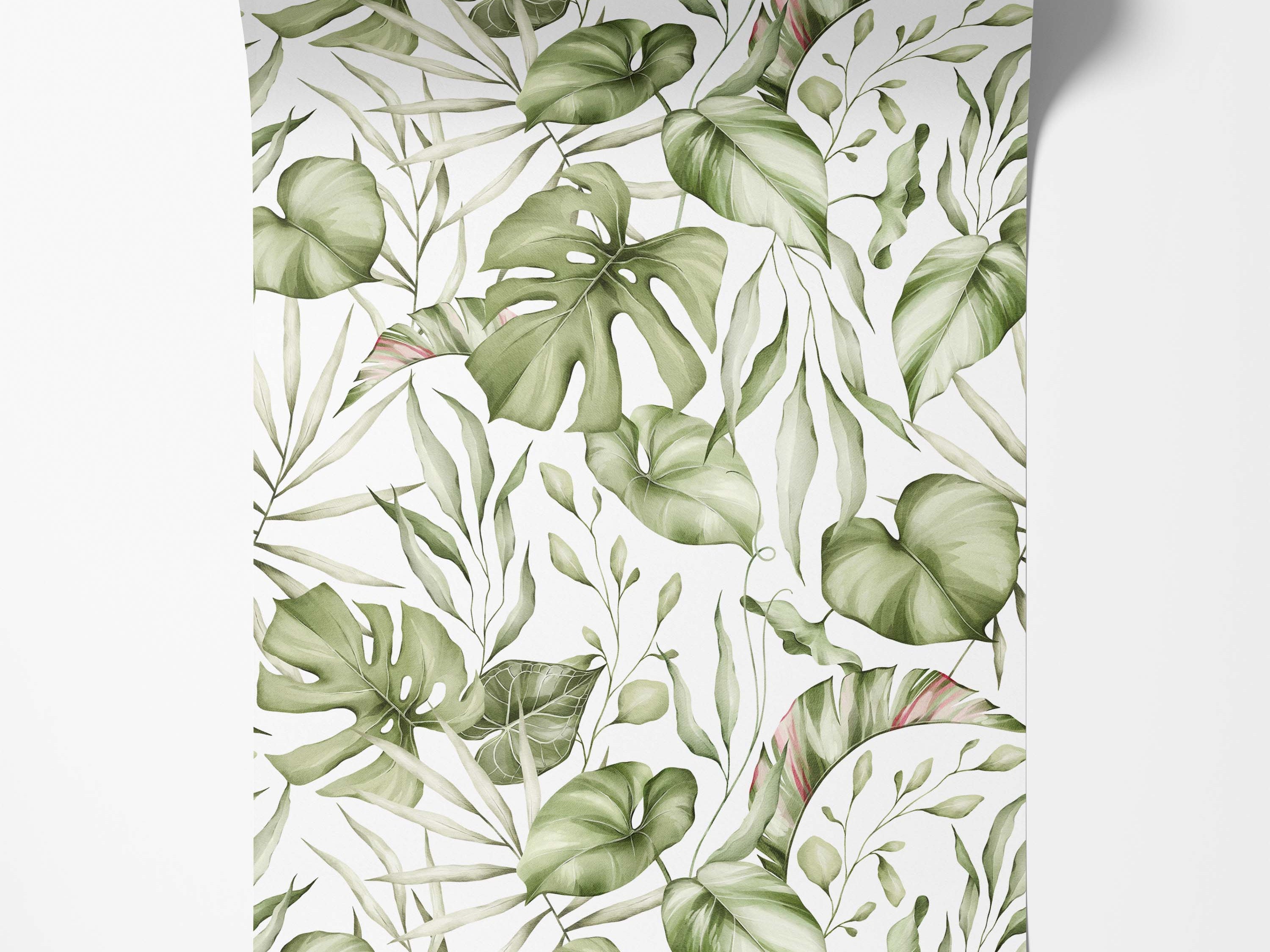 Wallpaper featuring a watercolor pattern of assorted green tropical leaves, including Monstera, on a white background.