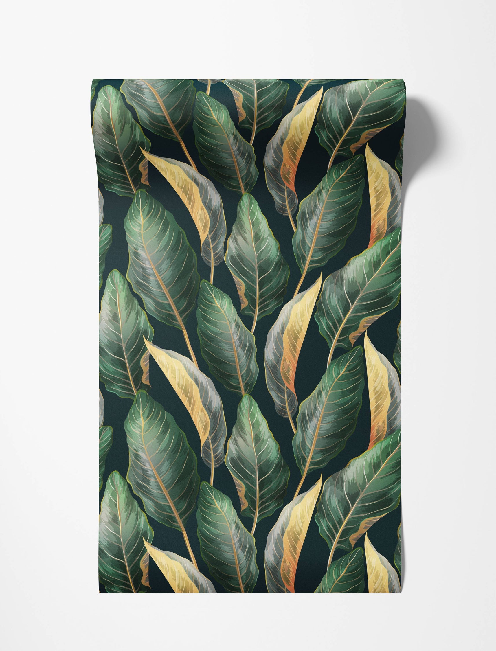 Wallpaper with a repeating pattern of large, stylized tropical leaves in green, yellow, and gold on a dark green background.