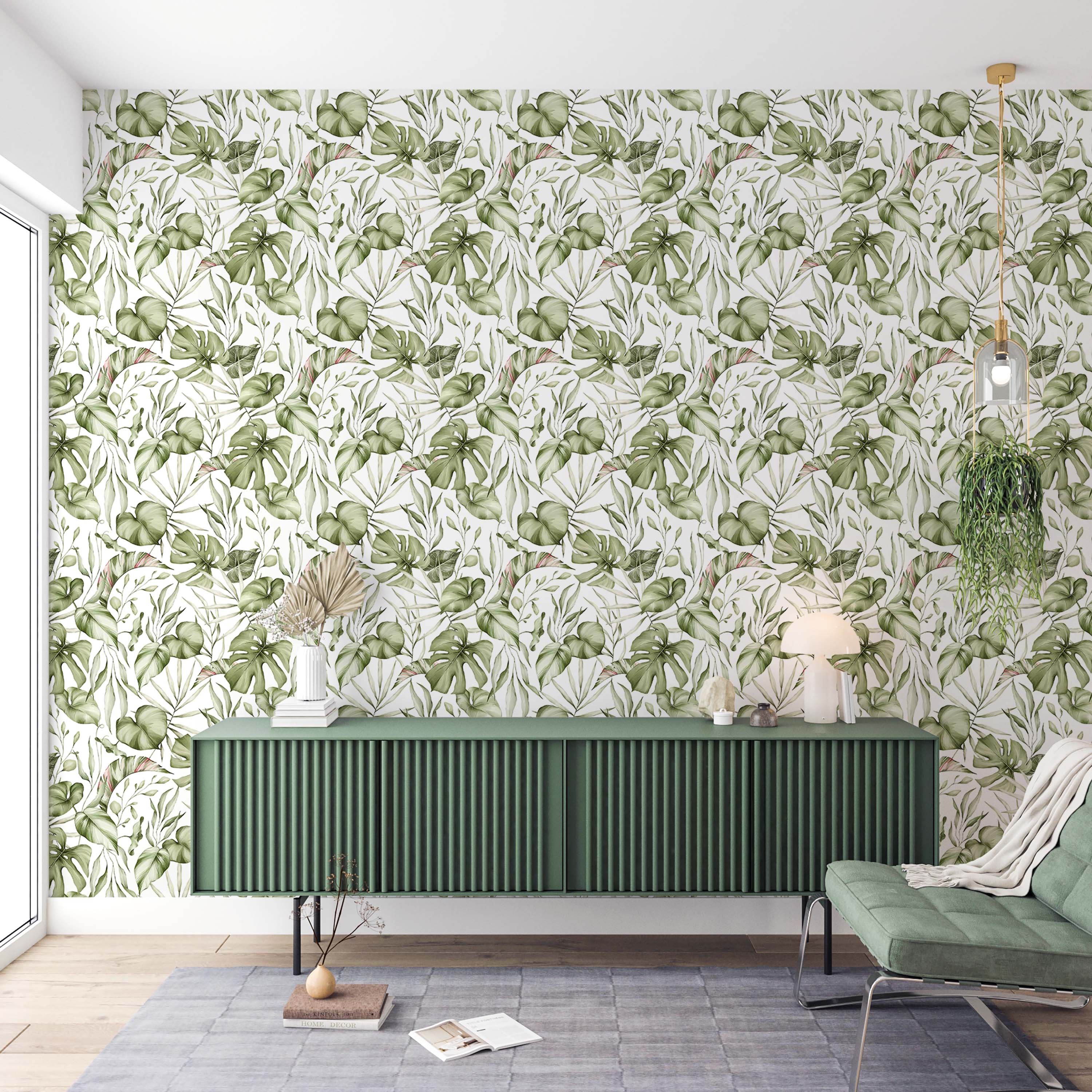 Watercolor wallpaper featuring a repeating pattern of assorted green tropical leaves, including Monstera, on a white background.