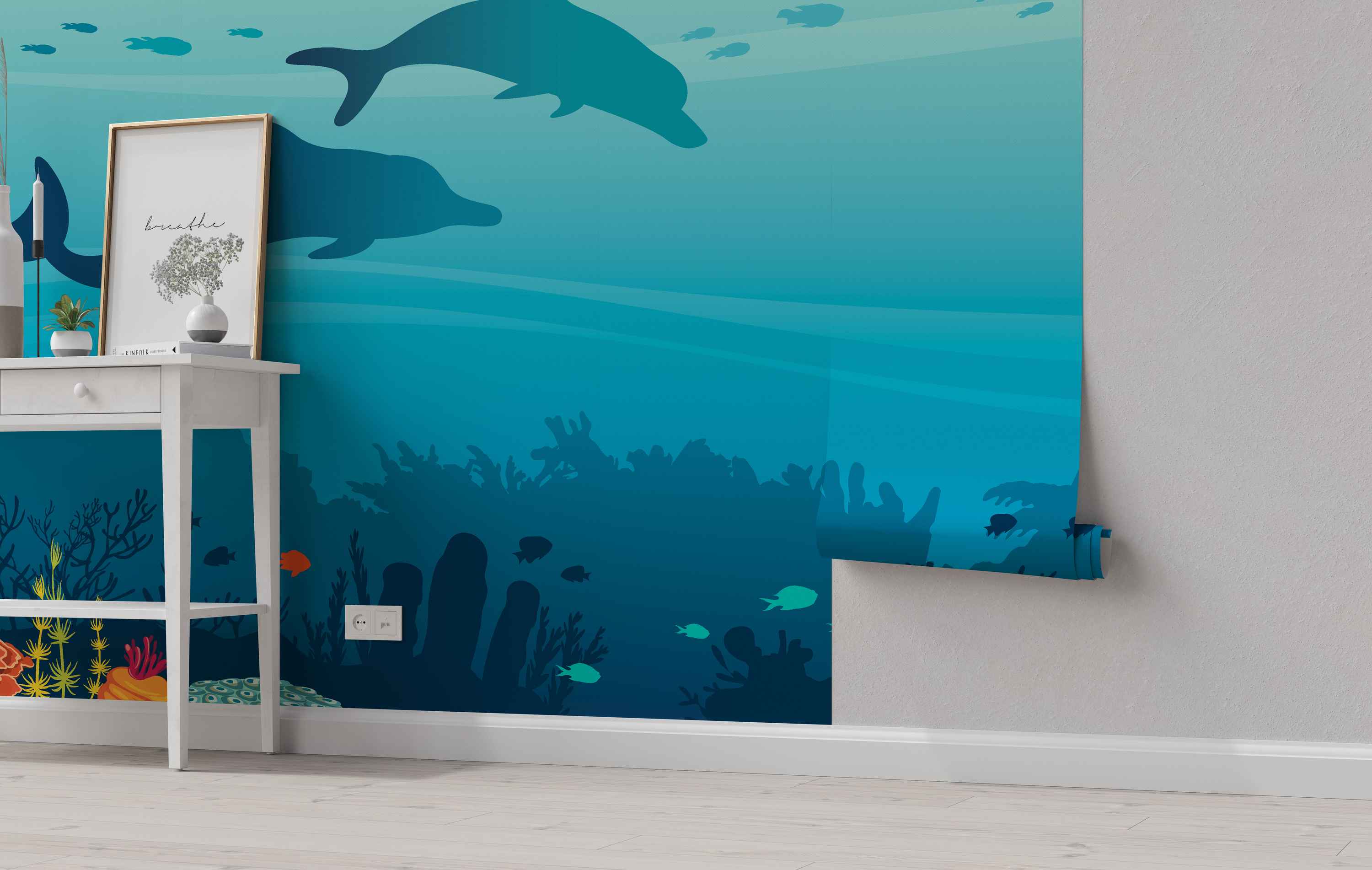 Underwater scene mural featuring silhouetted dolphins and fish swimming in shades of blue and teal above a dark blue coral reef.