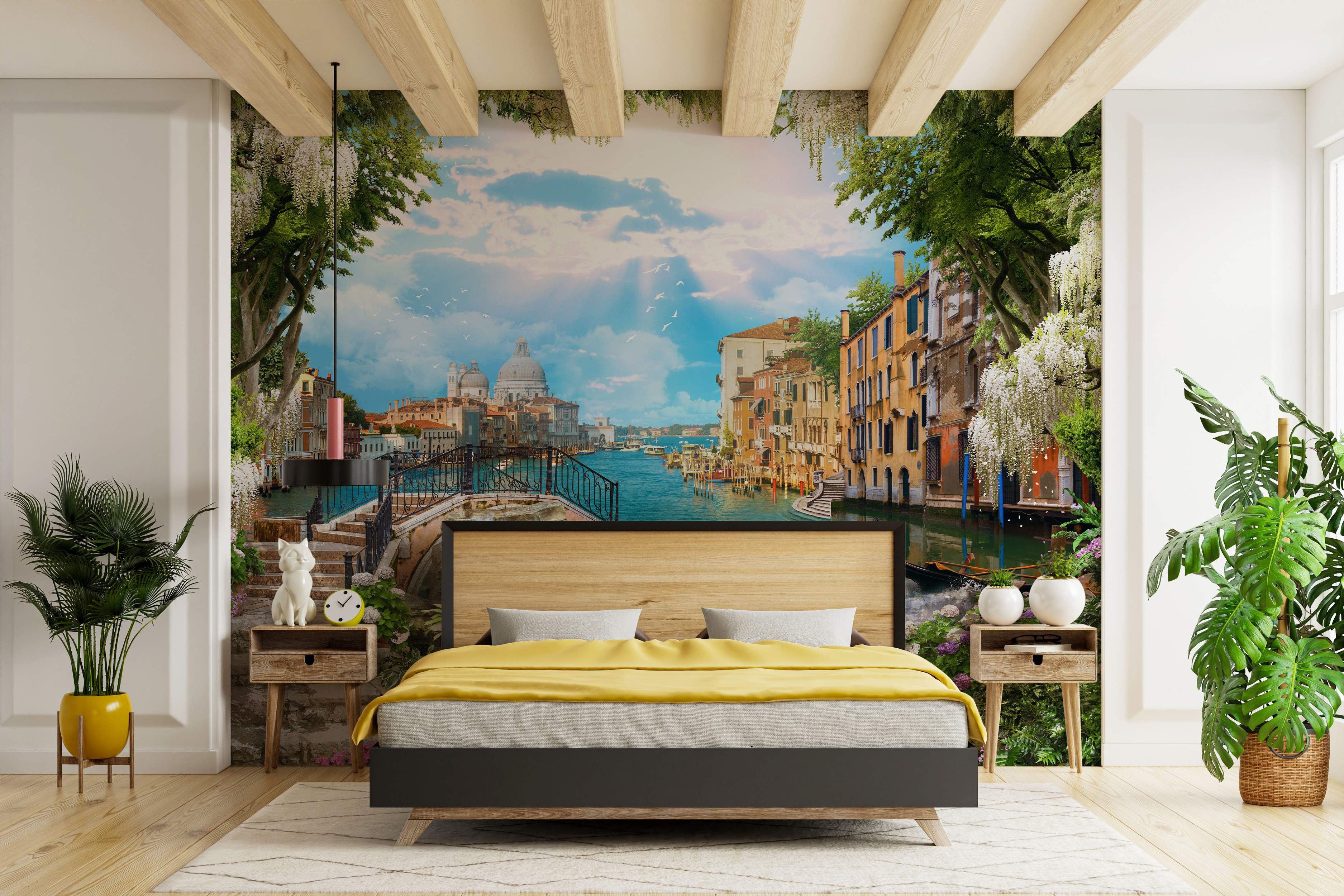 Mural depicting a sunny Venice canal scene with buildings, bridge, blue water, sky, and framing trees with white flowers.